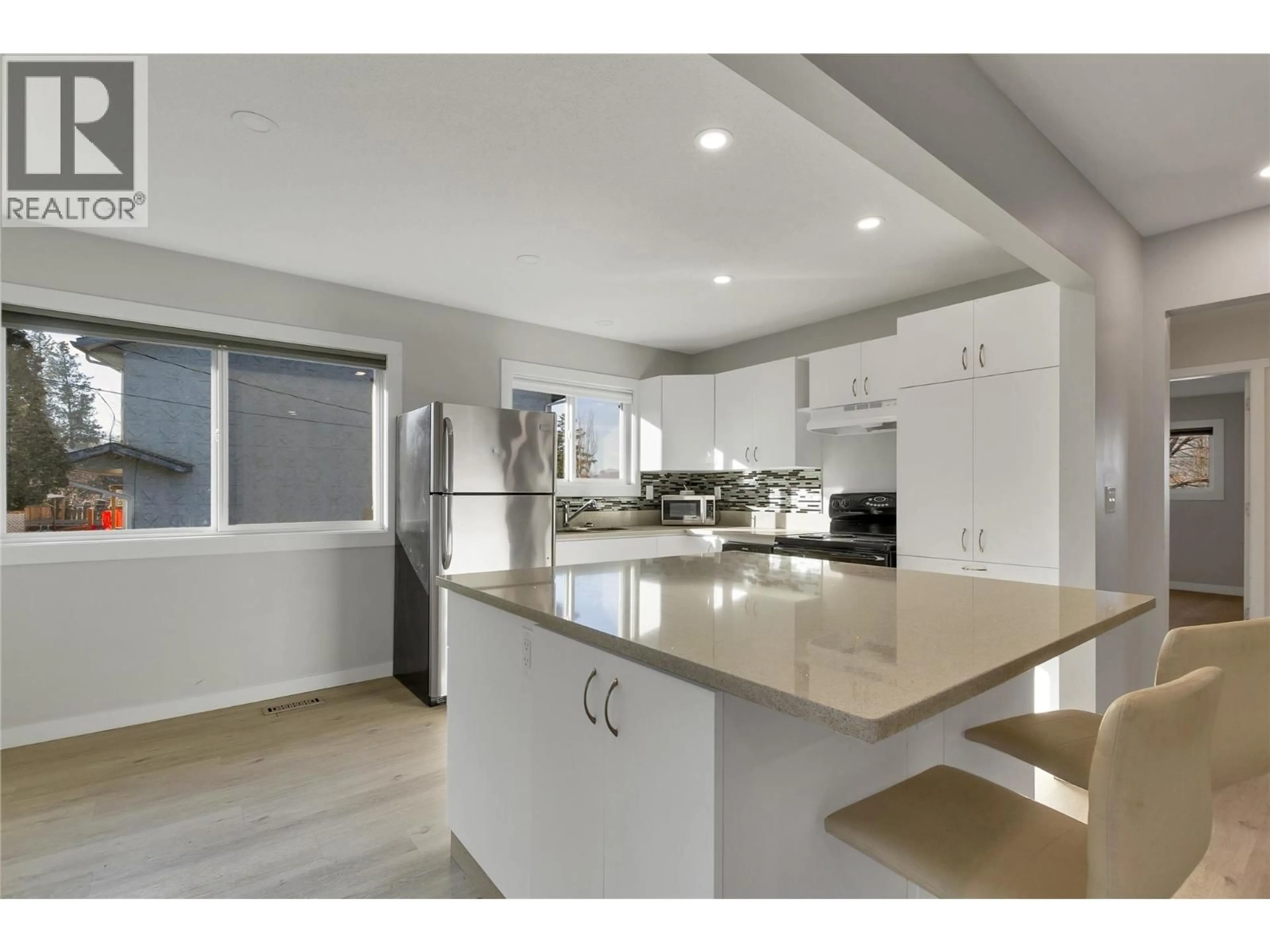 Open concept kitchen, ceramic/tile floor for 4018 PLEASANT VALLEY ROAD, Vernon British Columbia V1T4M2