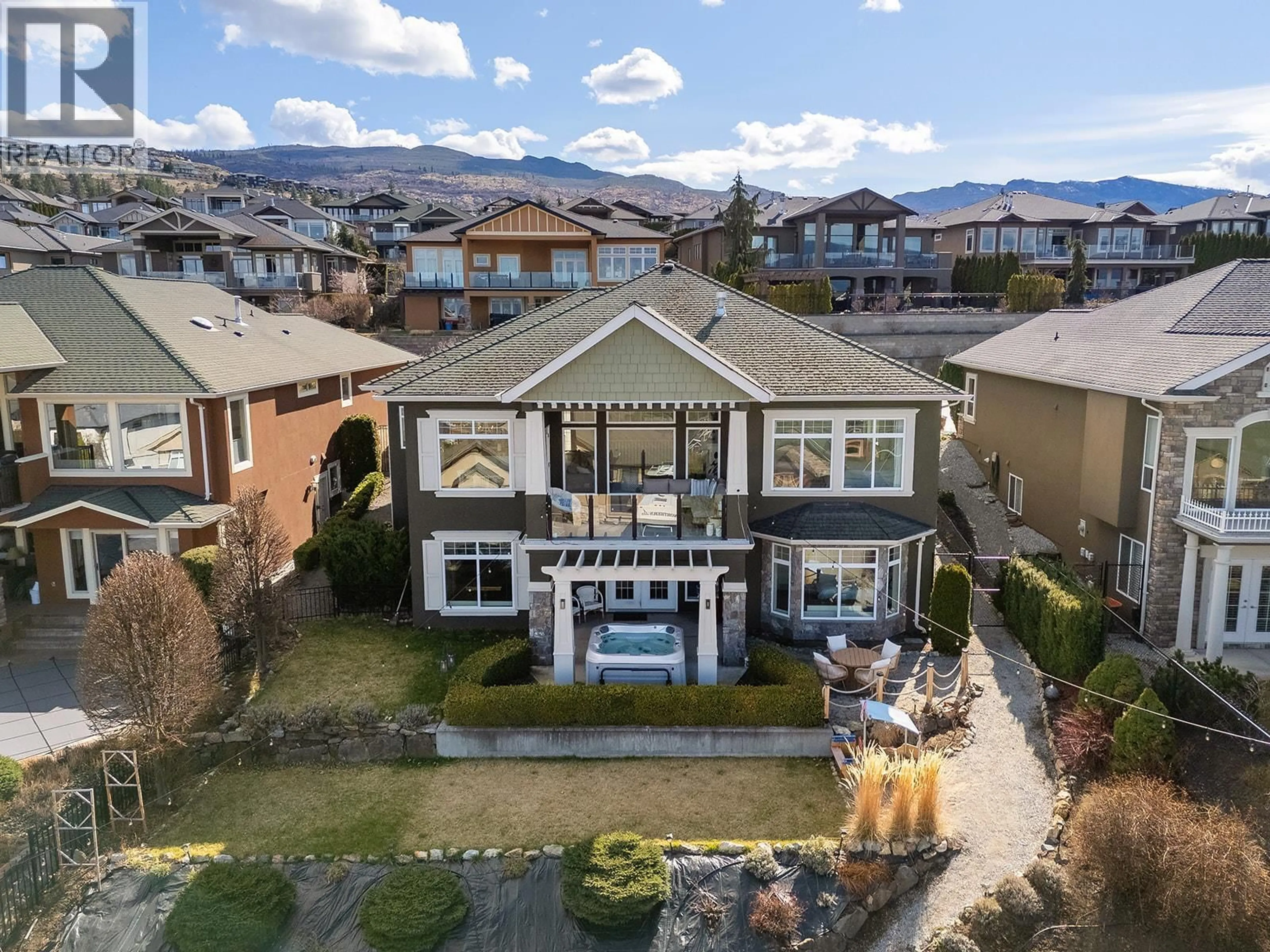 A pic from outside/outdoor area/front of a property/back of a property/a pic from drone, mountain view for 629 ALMANDINE COURT, Kelowna British Columbia V1W4Z5