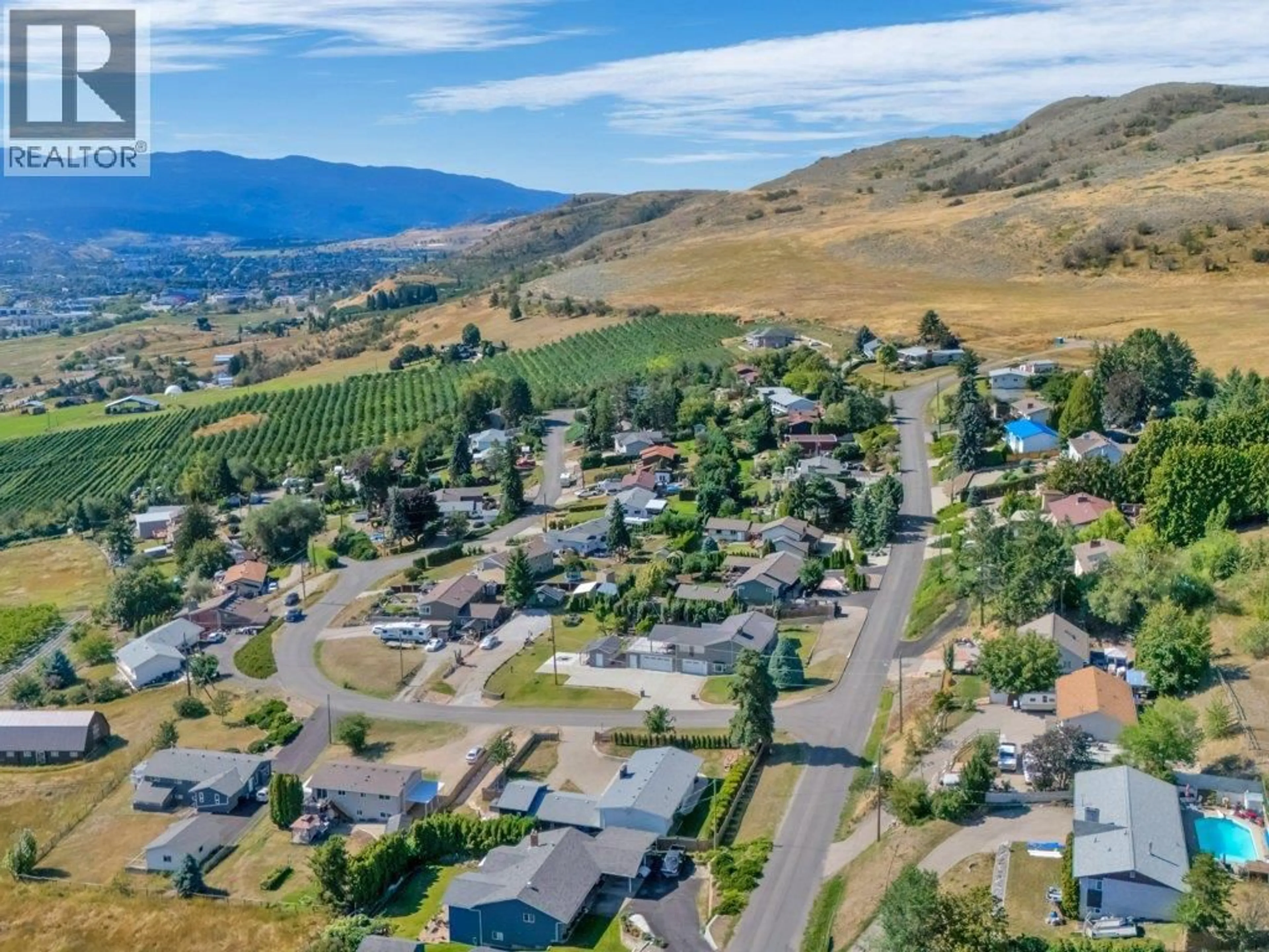 A pic from outside/outdoor area/front of a property/back of a property/a pic from drone, mountain view for 6475 BLUE JAY ROAD, Vernon British Columbia V1H1W5