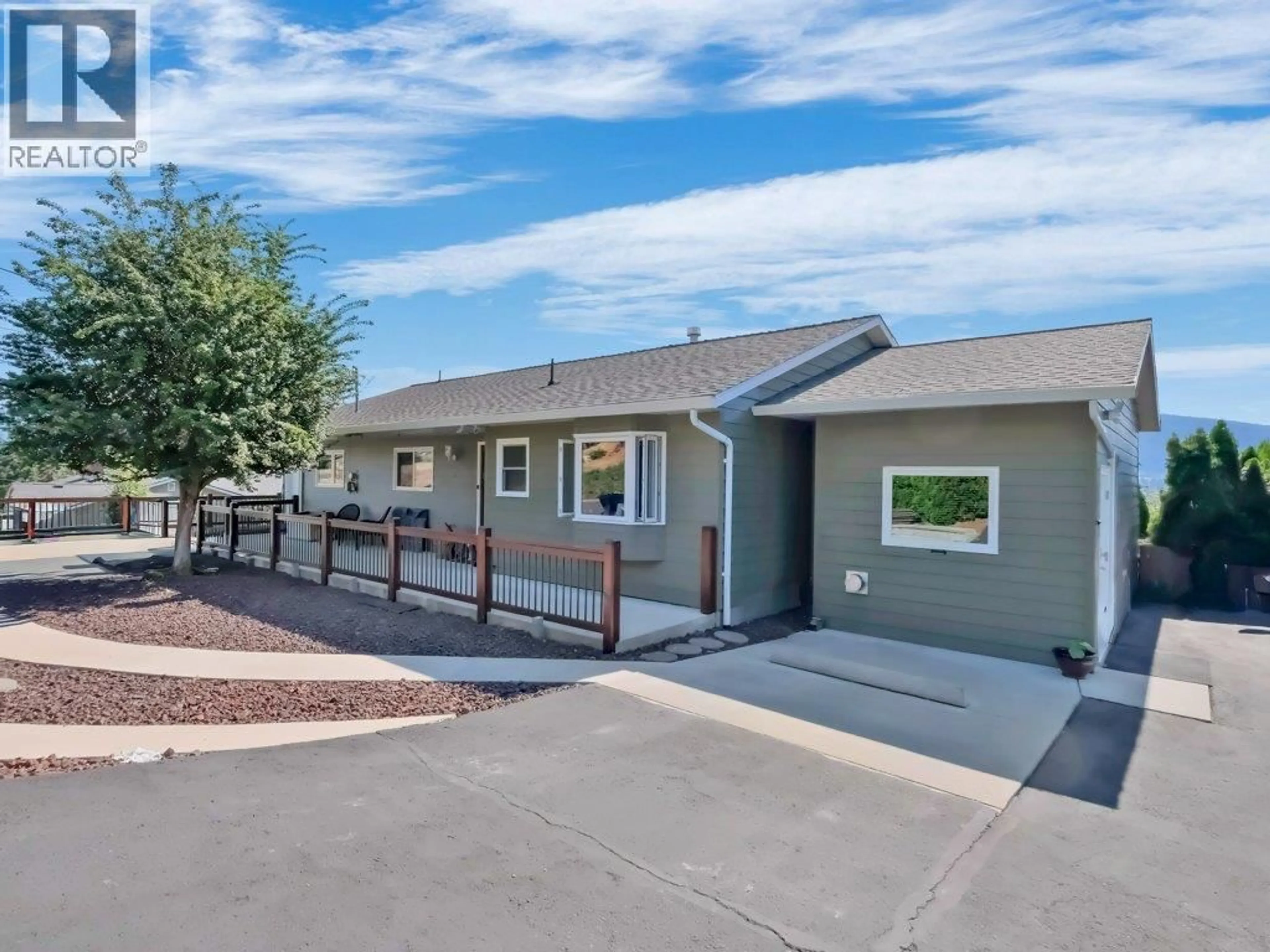 Home with vinyl exterior material, street for 6475 BLUE JAY ROAD, Vernon British Columbia V1H1W5