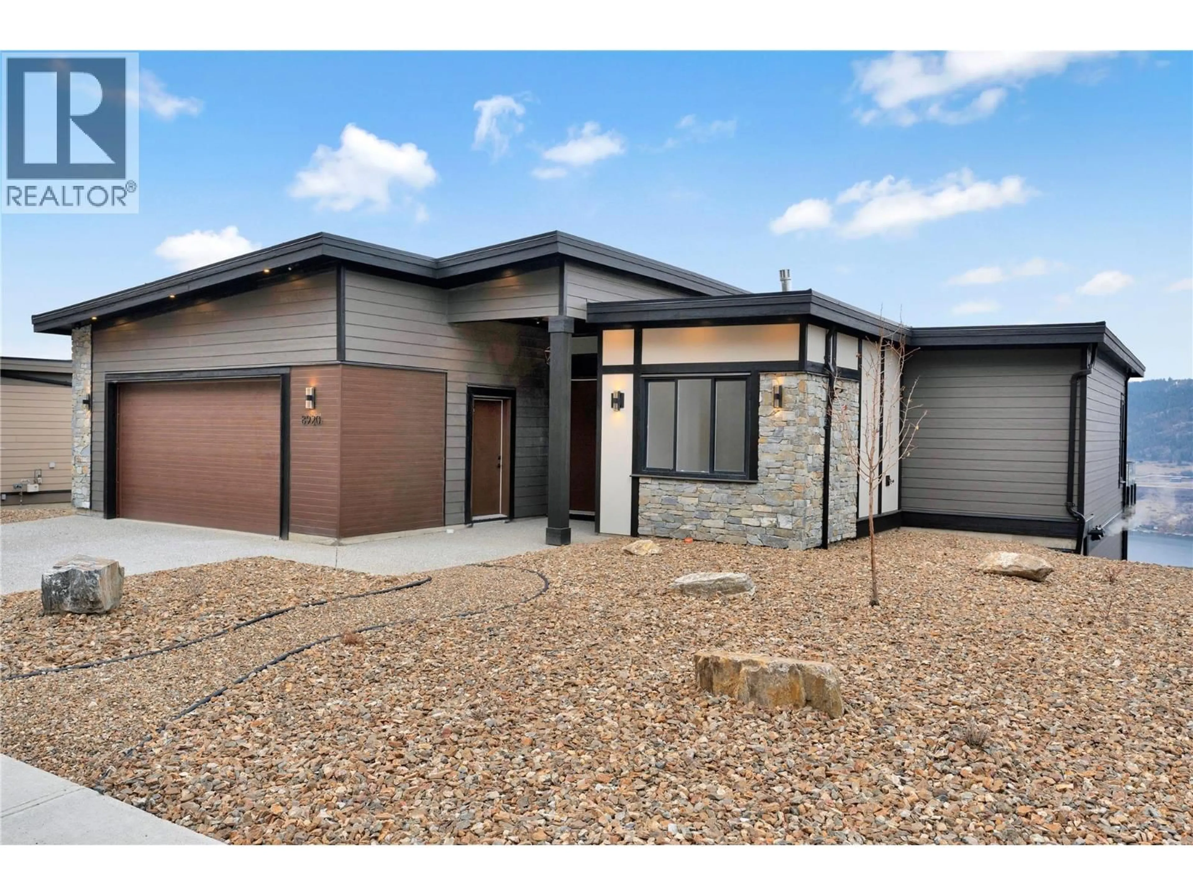 Home with brick exterior material, street for 8920 TAVISTOCK ROAD, Vernon British Columbia V1H2L4