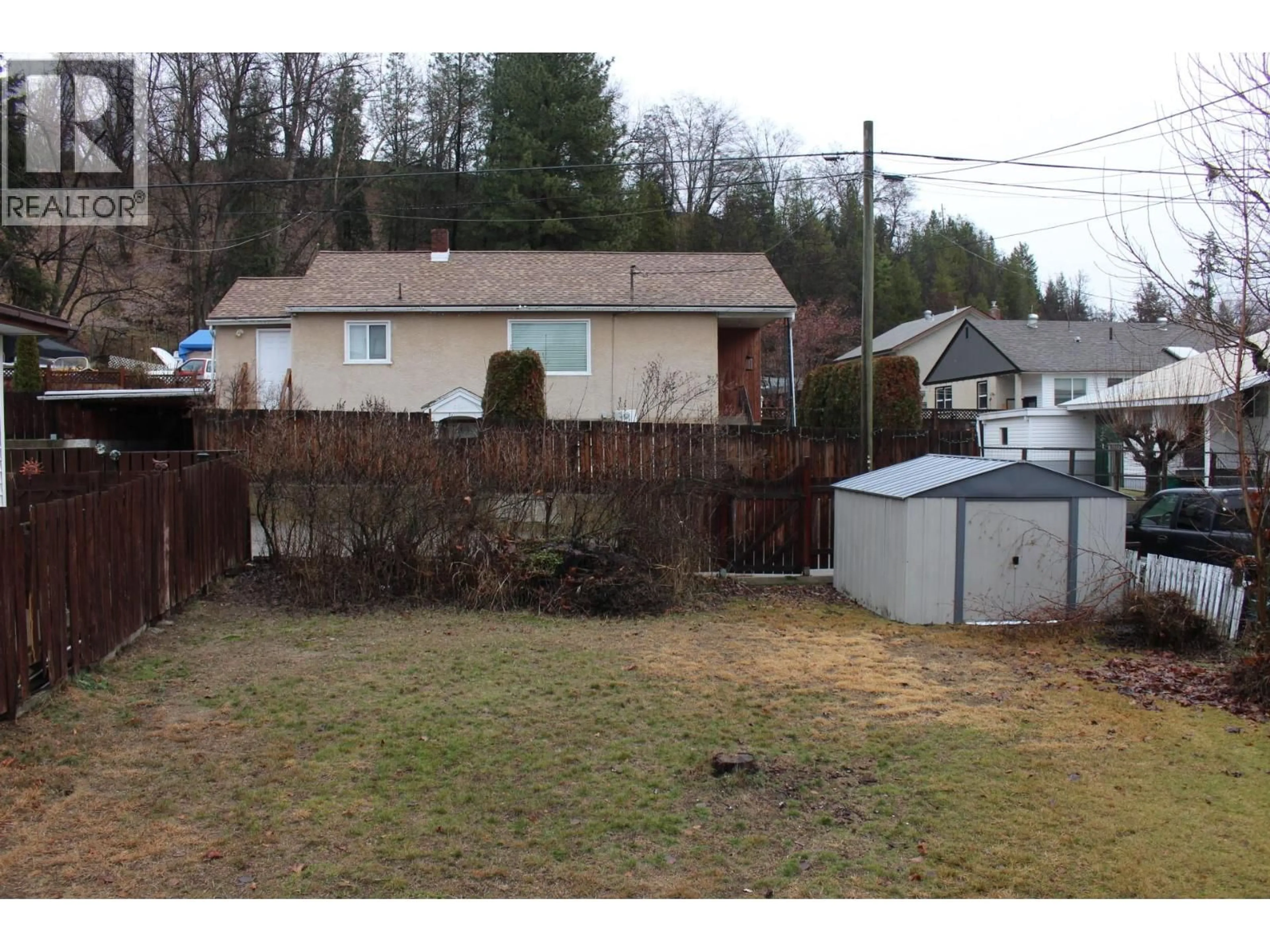 A pic from outside/outdoor area/front of a property/back of a property/a pic from drone, mountain view for 1540 MCBETH STREET, Trail British Columbia V1R1Z4