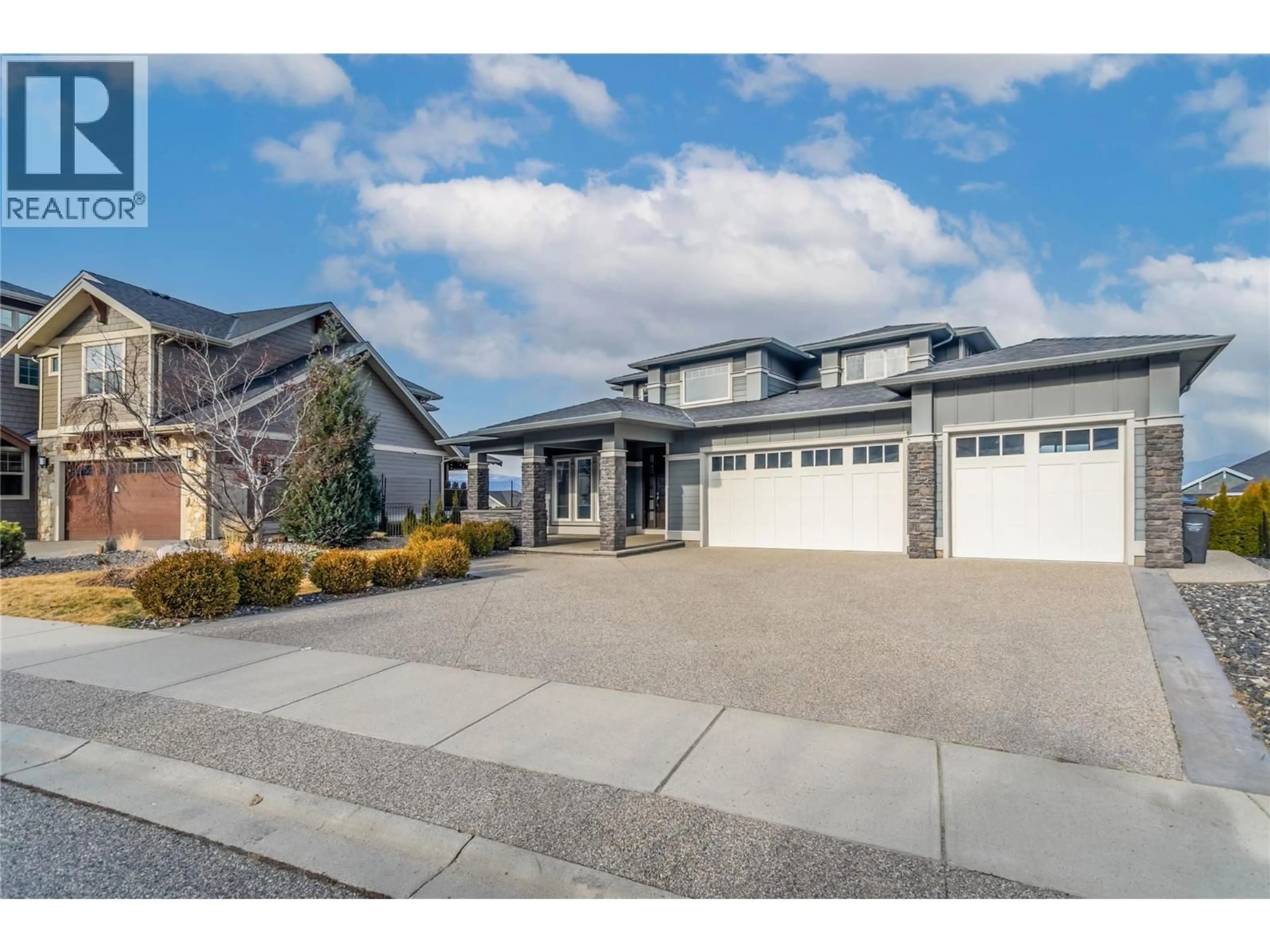 Home with vinyl exterior material, street for 440 AUDUBON COURT, Kelowna British Columbia V1W5K3