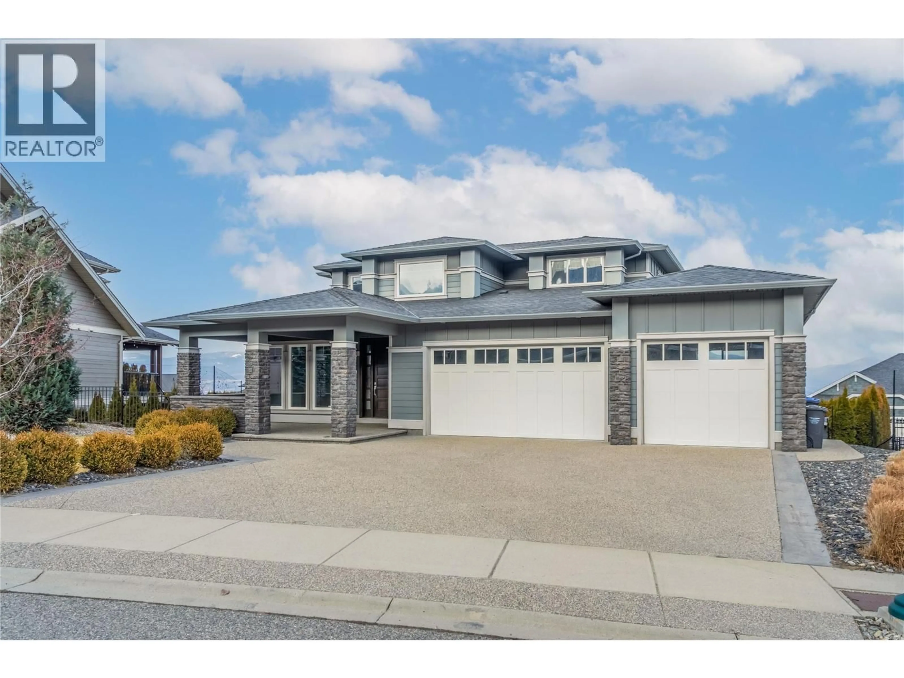 Home with vinyl exterior material, street for 440 AUDUBON COURT, Kelowna British Columbia V1W5K3