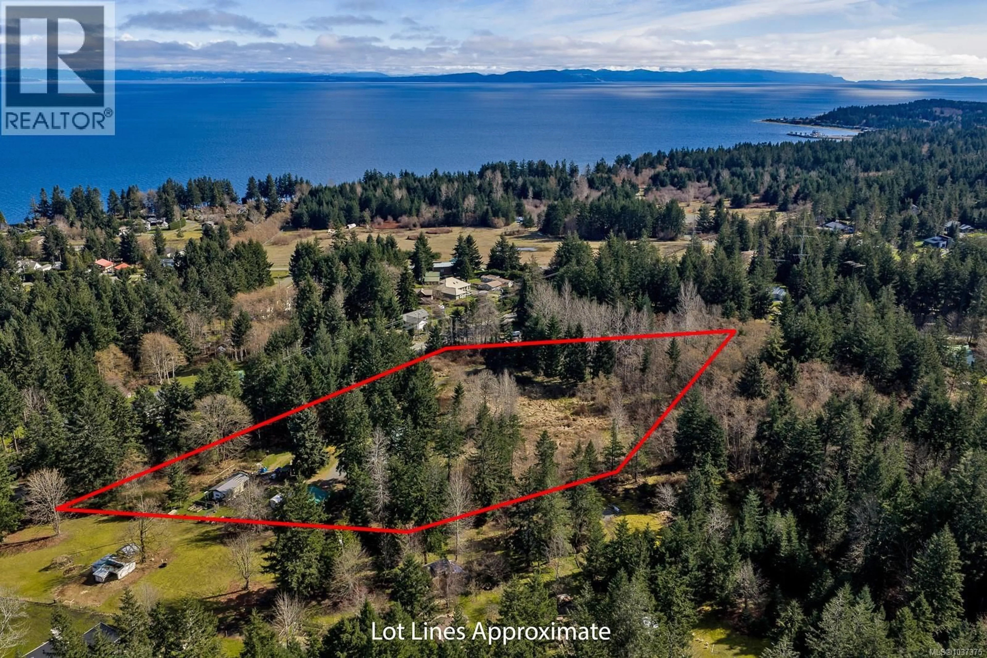 A pic from outside/outdoor area/front of a property/back of a property/a pic from drone, water/lake/river/ocean view for 2187 MAY ROAD, Courtenay British Columbia V9J1X7
