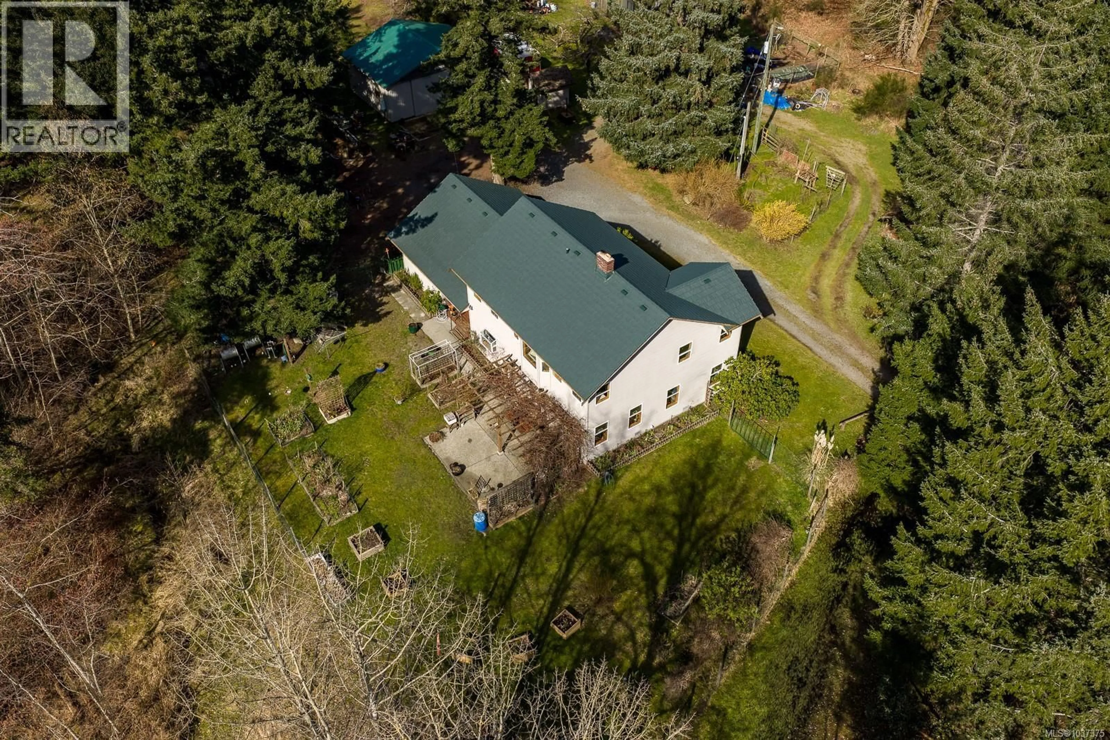A pic from outside/outdoor area/front of a property/back of a property/a pic from drone, building for 2187 MAY ROAD, Courtenay British Columbia V9J1X7