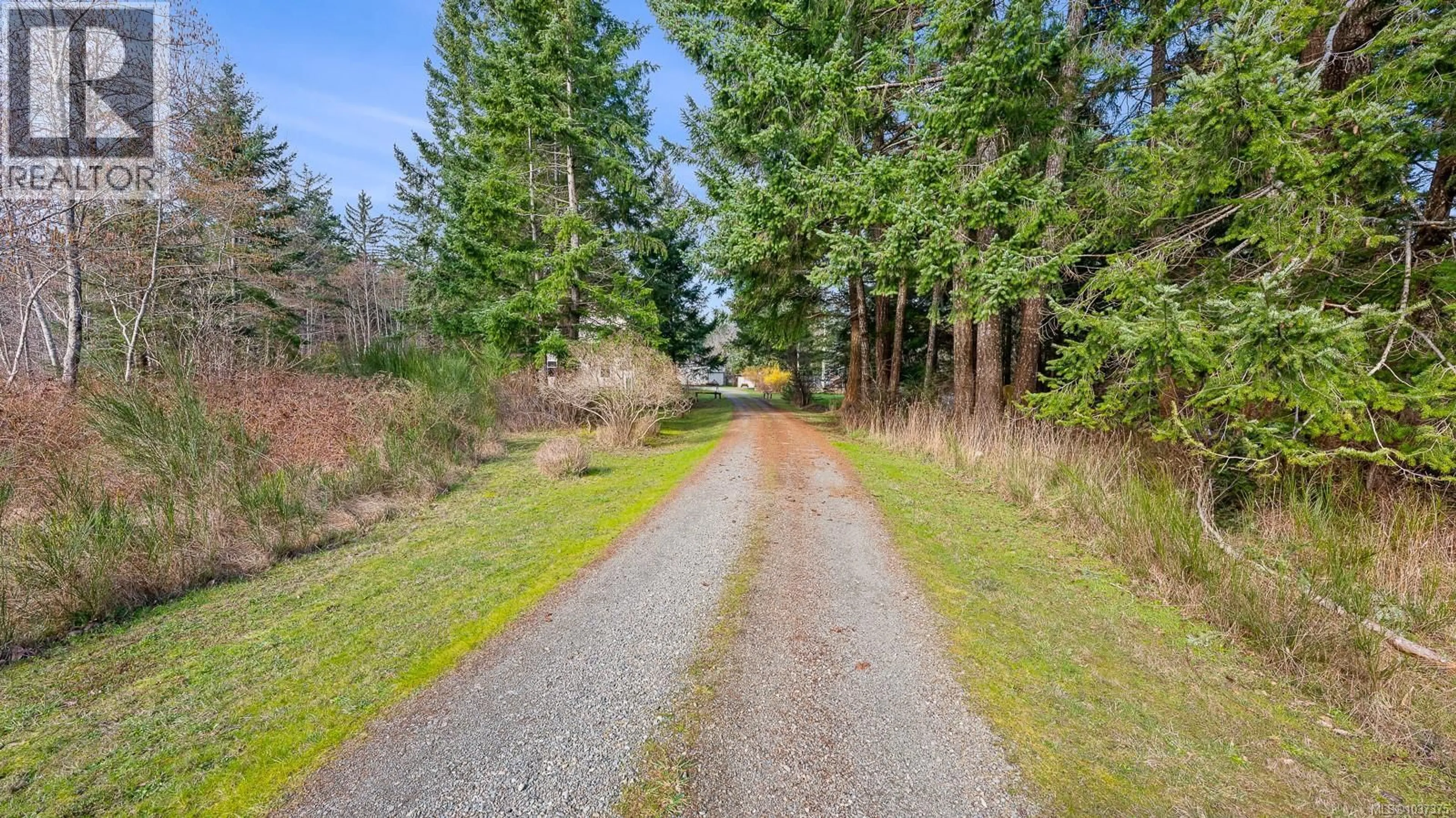 A pic from outside/outdoor area/front of a property/back of a property/a pic from drone, forest/trees view for 2187 MAY ROAD, Courtenay British Columbia V9J1X7