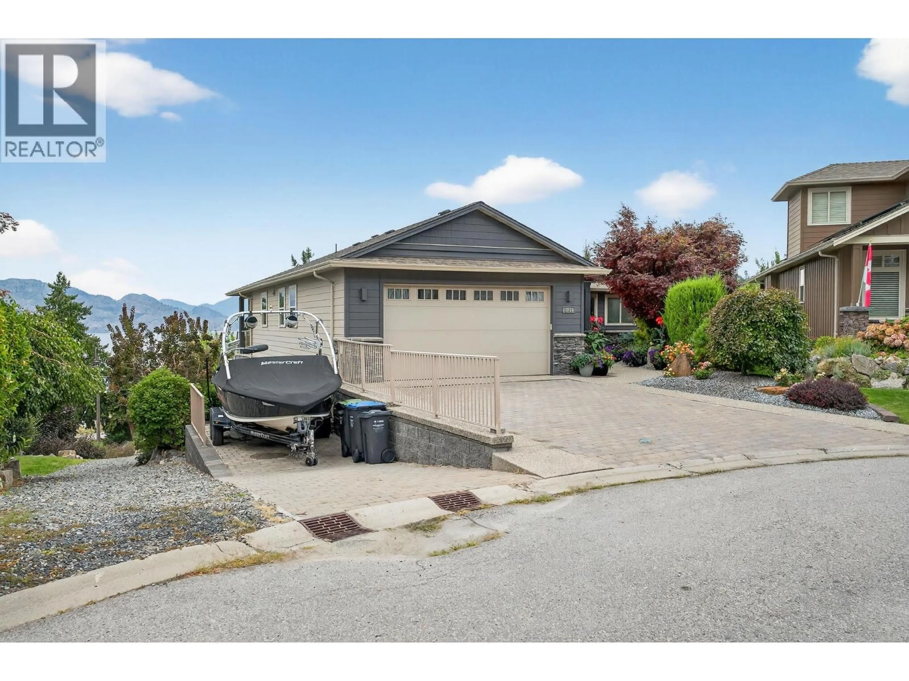 A pic from outside/outdoor area/front of a property/back of a property/a pic from drone, street for 3751 LORNELL COURT, Peachland British Columbia V0H1X2