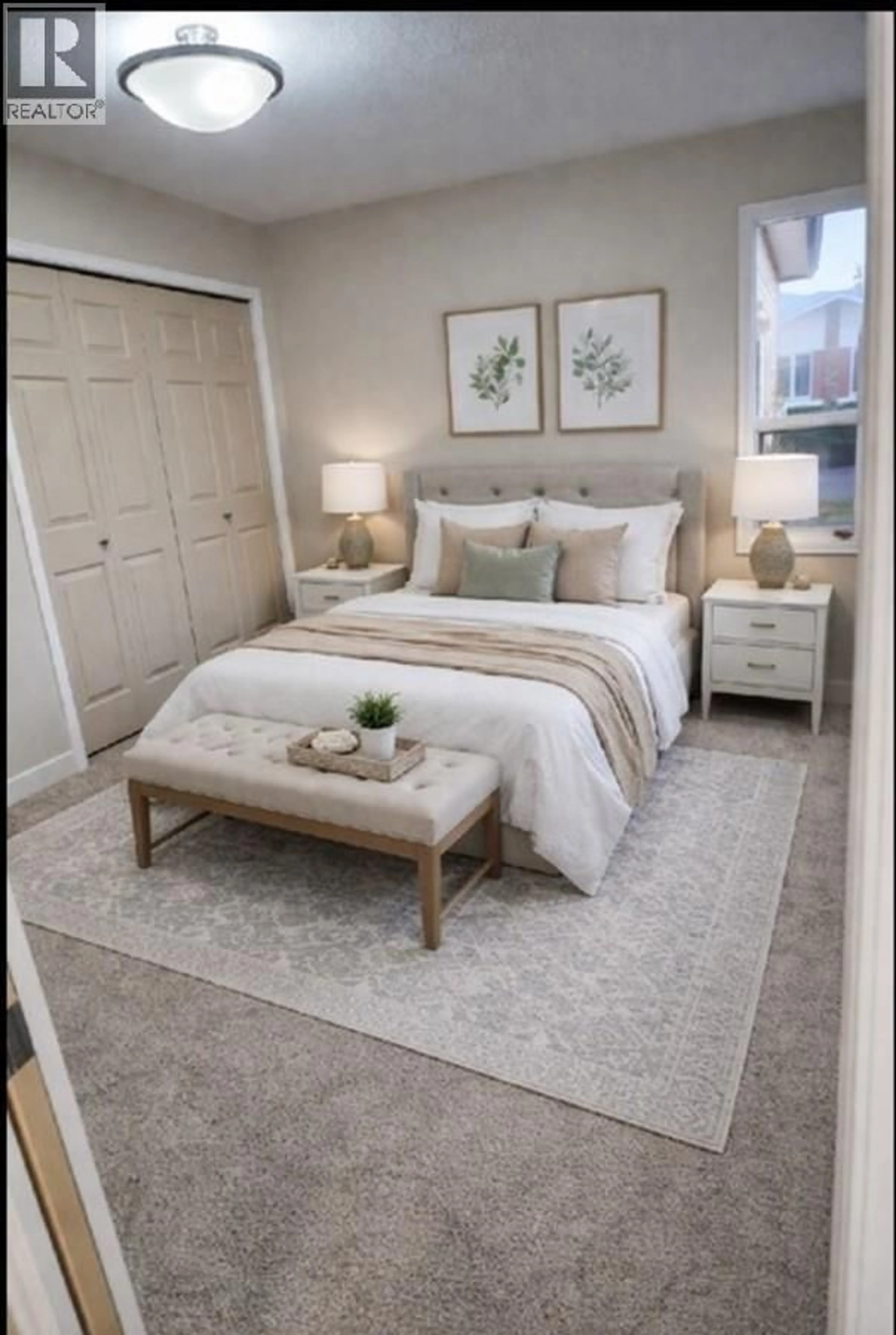 Bedroom with bed, carpet floor for 202 - 1255 RAYMER AVENUE, Kelowna British Columbia V1W3S3