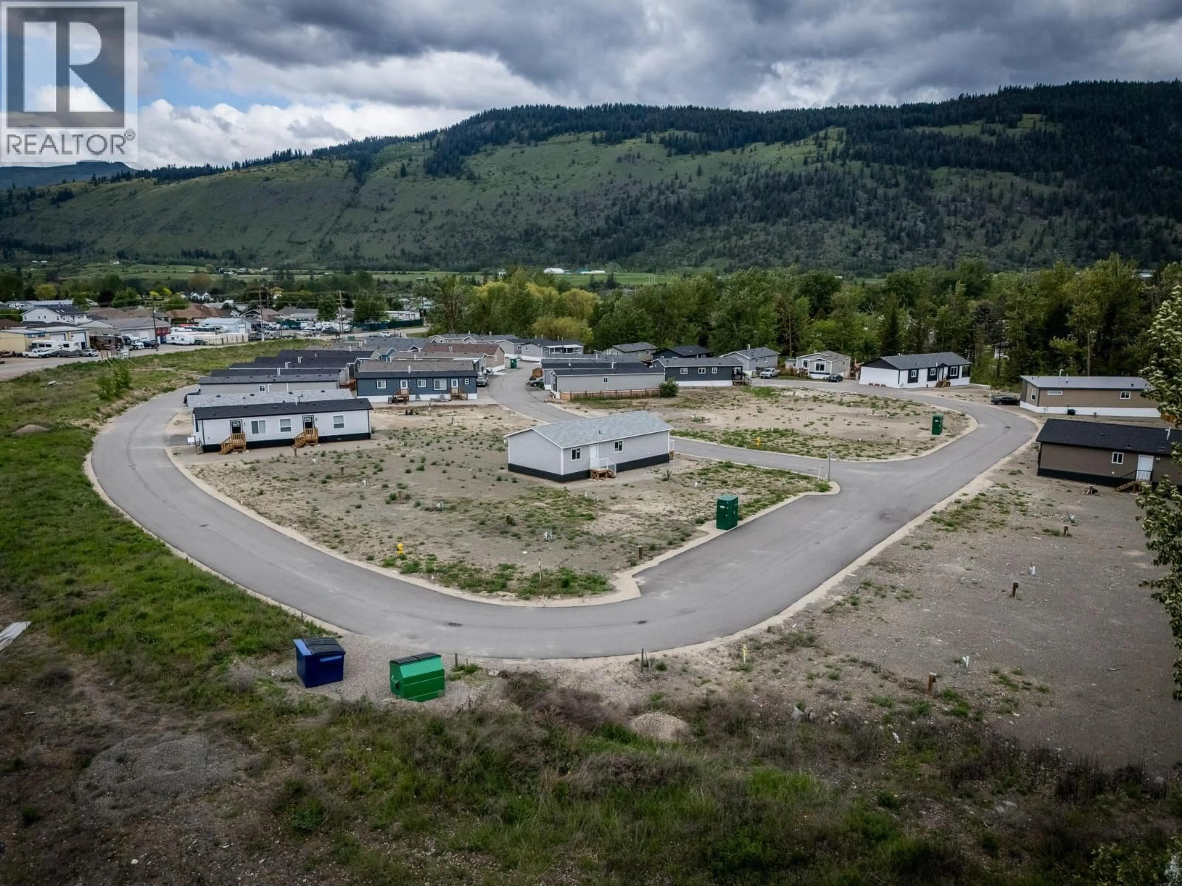 A pic from outside/outdoor area/front of a property/back of a property/a pic from drone, mountain view for 235 AYLMER ROAD, Chase British Columbia V0E1M1