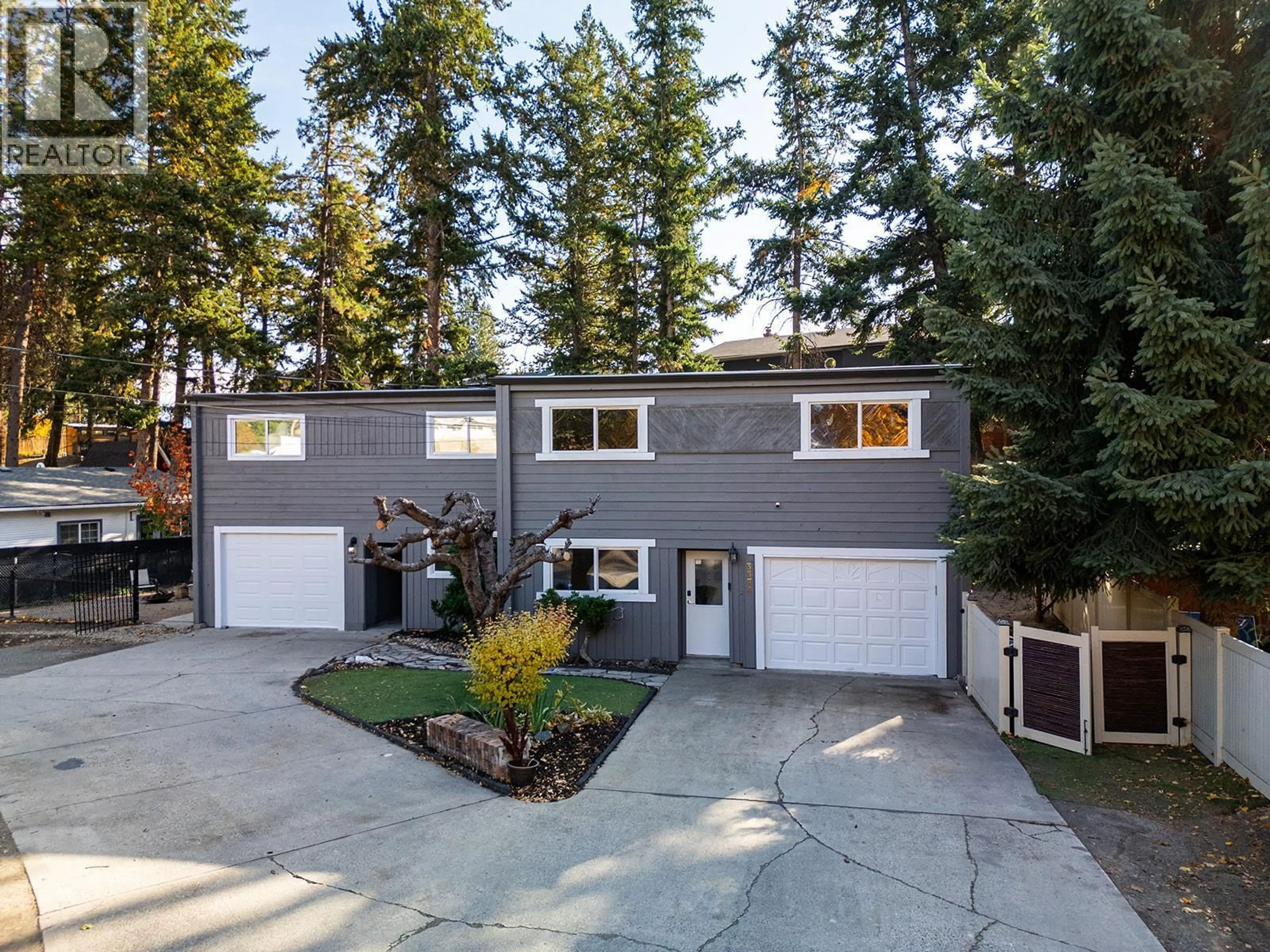 Home with vinyl exterior material, street for 3376/3378 MCMILLAN ROAD, West Kelowna British Columbia V4T1H1