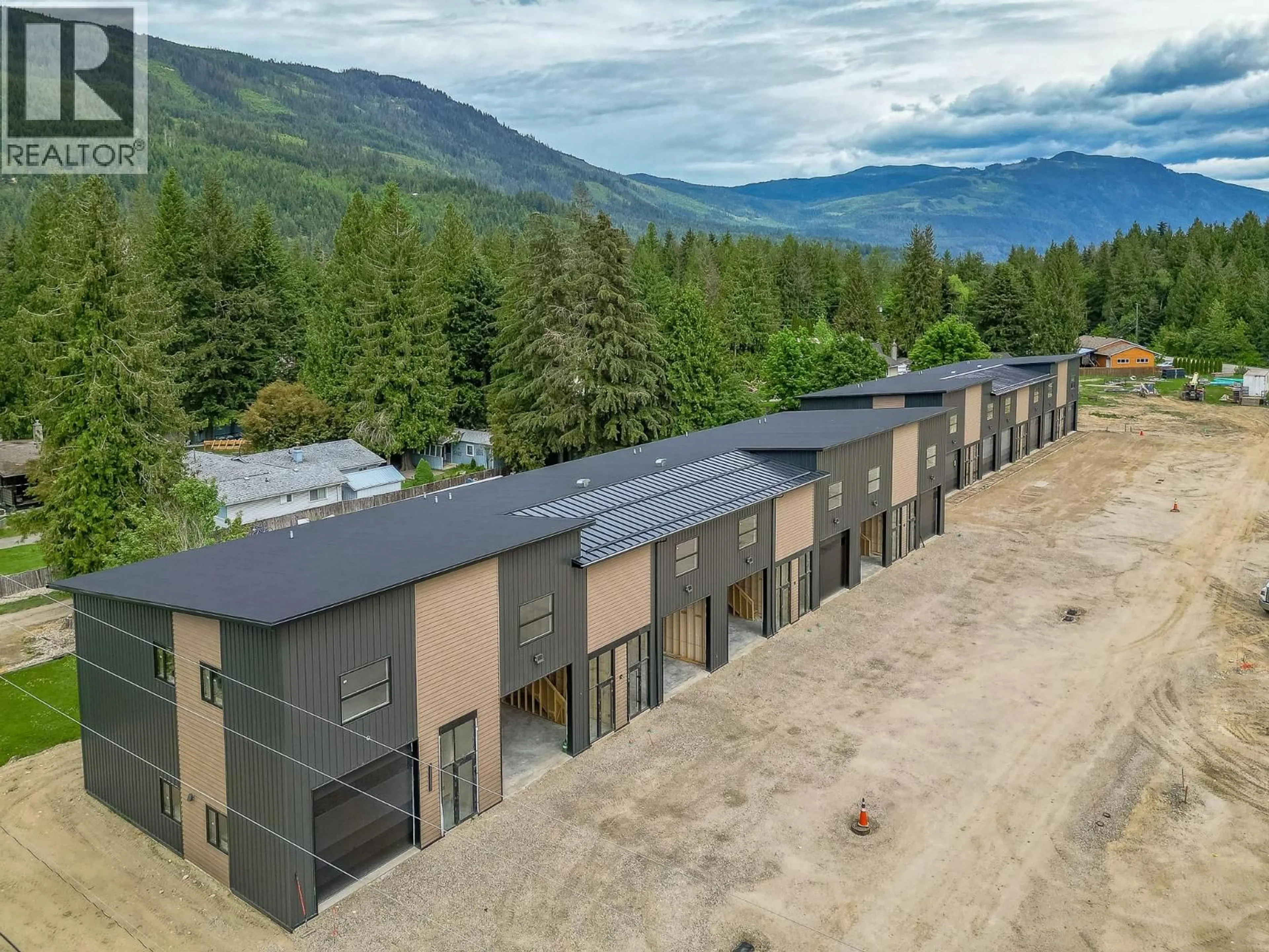 A pic from outside/outdoor area/front of a property/back of a property/a pic from drone, mountain view for 10 - 1002 SEED FRONTAGE ROAD, Sicamous British Columbia V0E2V4