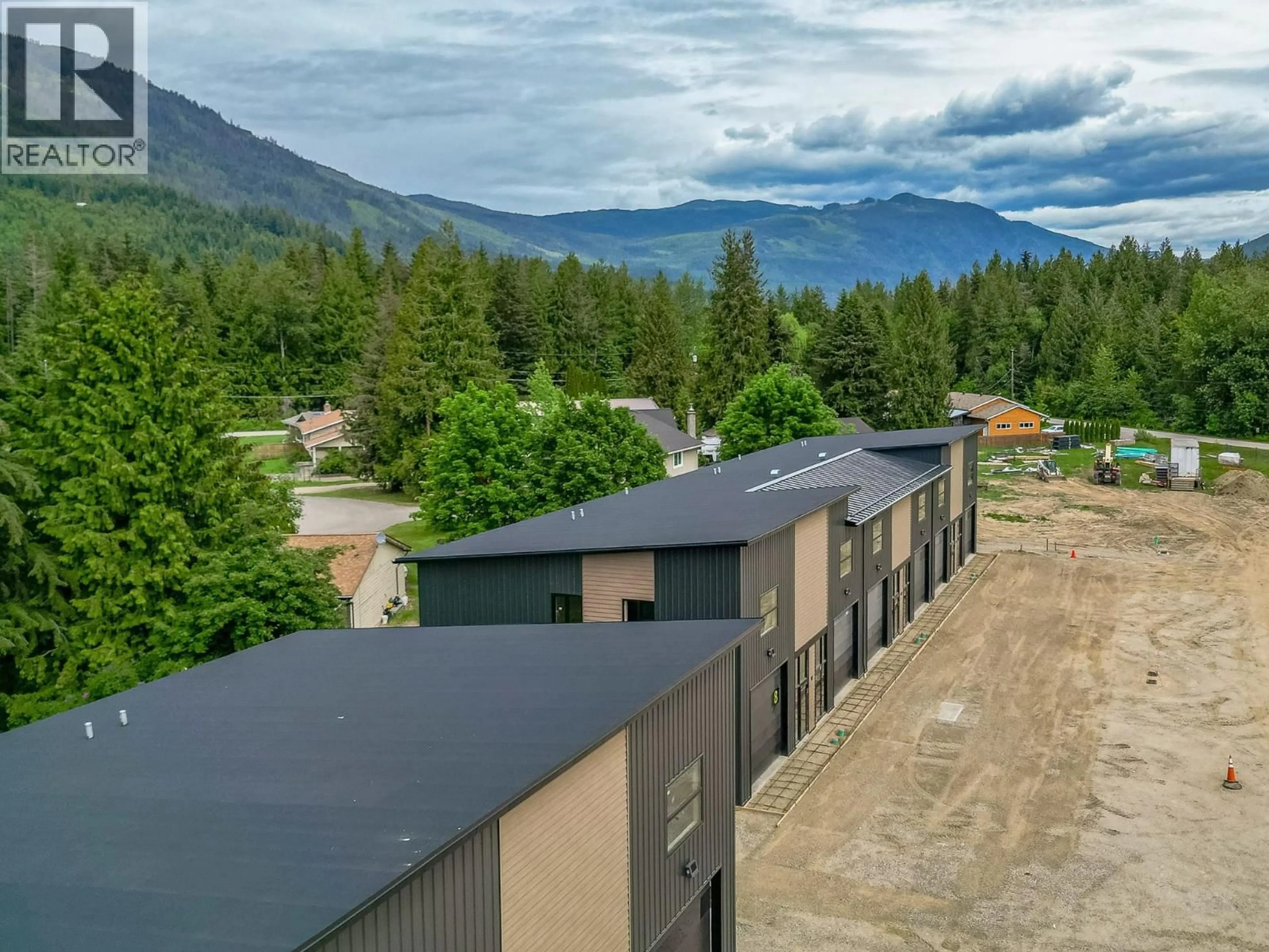 A pic from outside/outdoor area/front of a property/back of a property/a pic from drone, mountain view for 10 - 1002 SEED FRONTAGE ROAD, Sicamous British Columbia V0E2V4