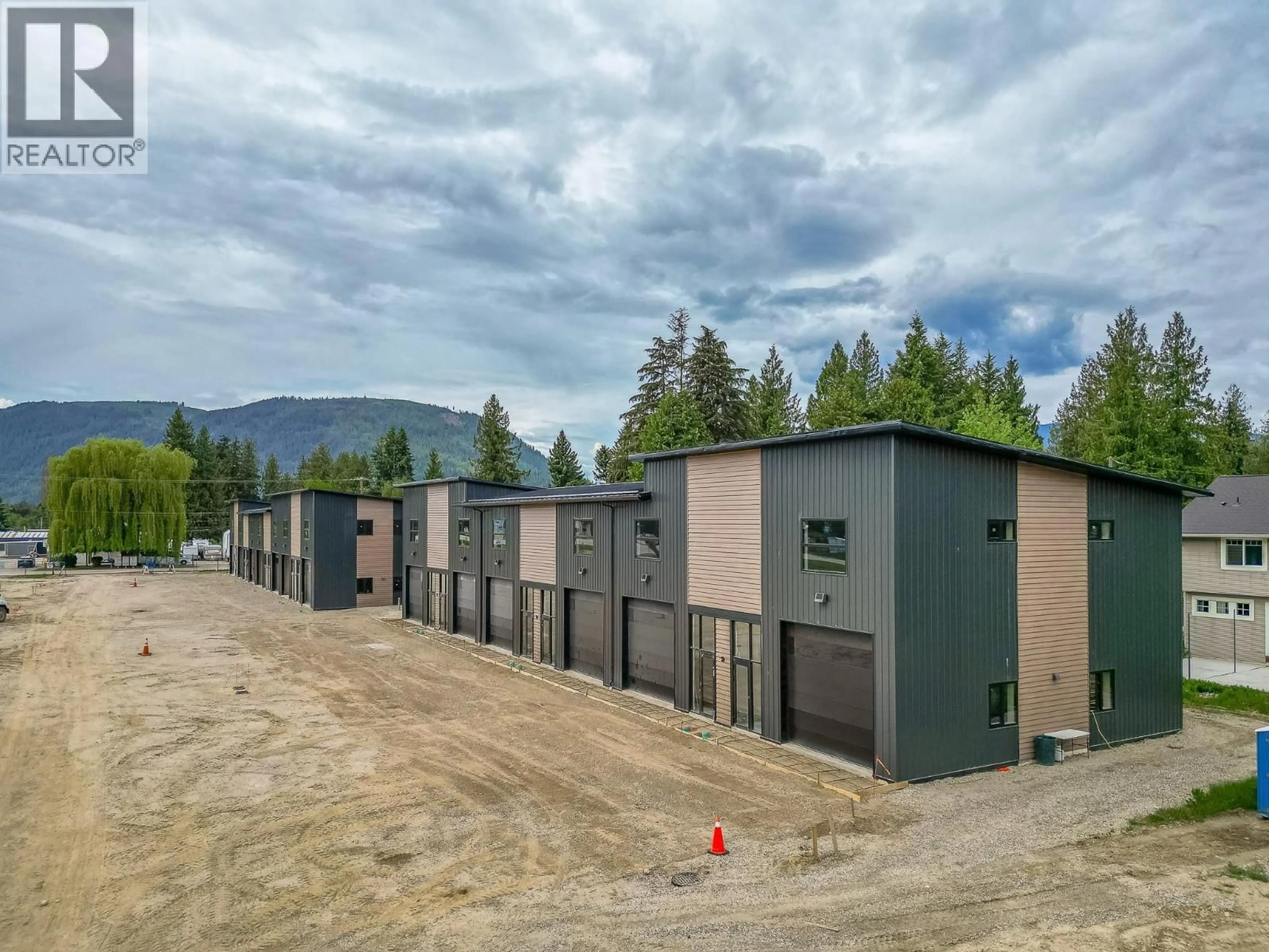 A pic from outside/outdoor area/front of a property/back of a property/a pic from drone, unknown for 10 - 1002 SEED FRONTAGE ROAD, Sicamous British Columbia V0E2V4