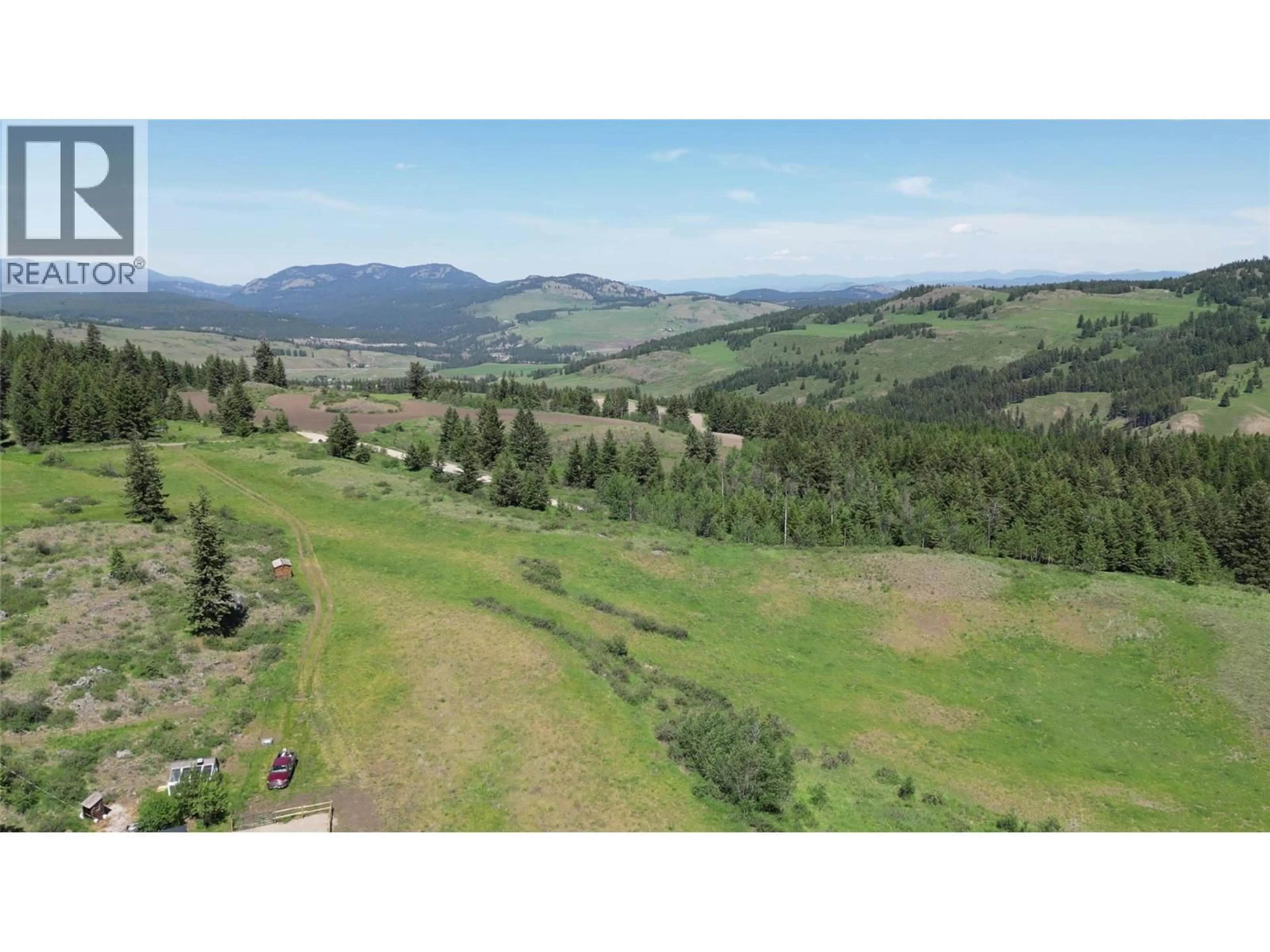 A pic from outside/outdoor area/front of a property/back of a property/a pic from drone, mountain view for Plan 34365 ROCK CREEK BRIDESVILLE ROAD, Bridesville British Columbia V0H1Y0