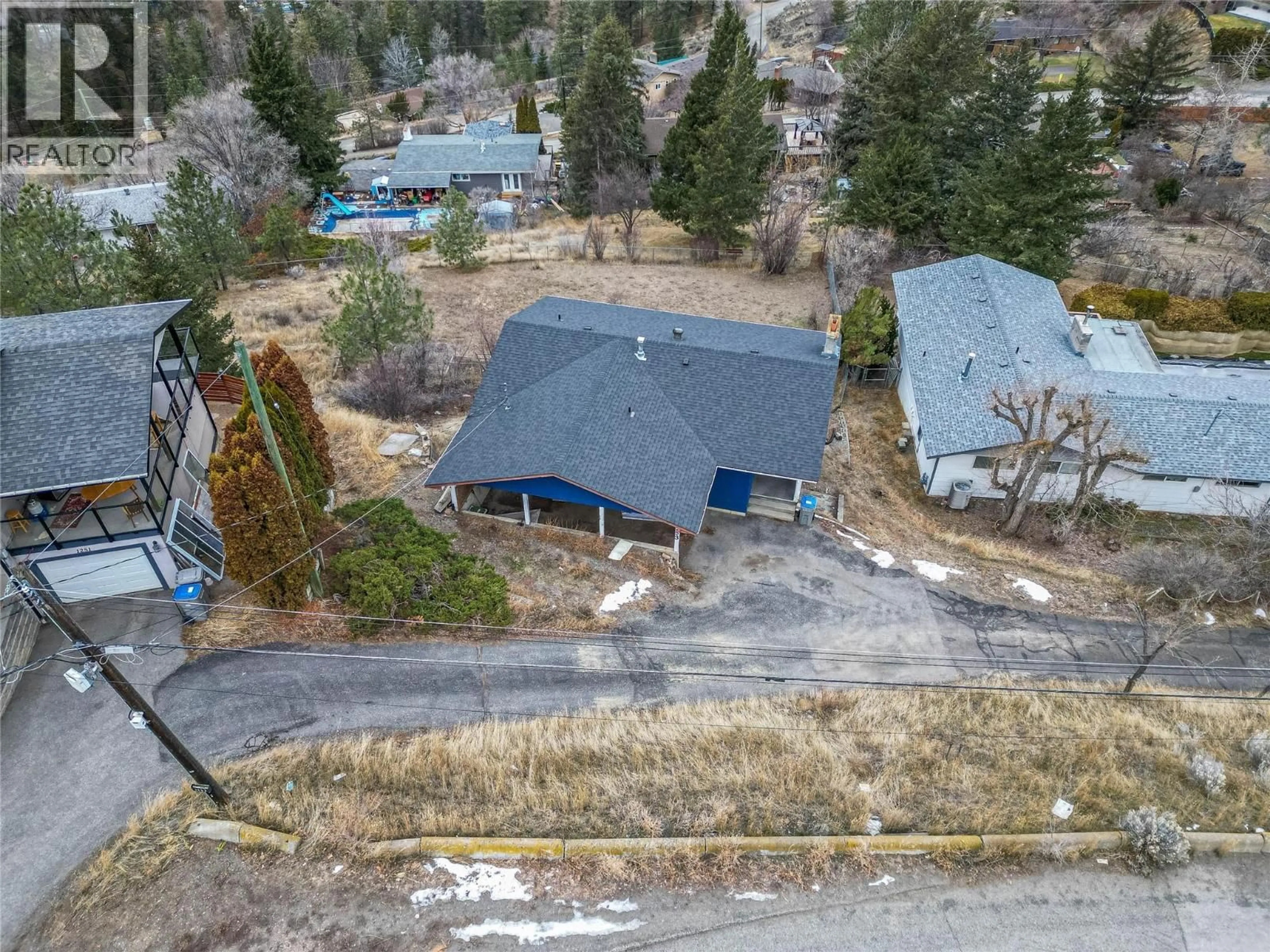 A pic from outside/outdoor area/front of a property/back of a property/a pic from drone, unknown for 1253 HIGHRIDGE DRIVE, Kamloops British Columbia V2C5G5
