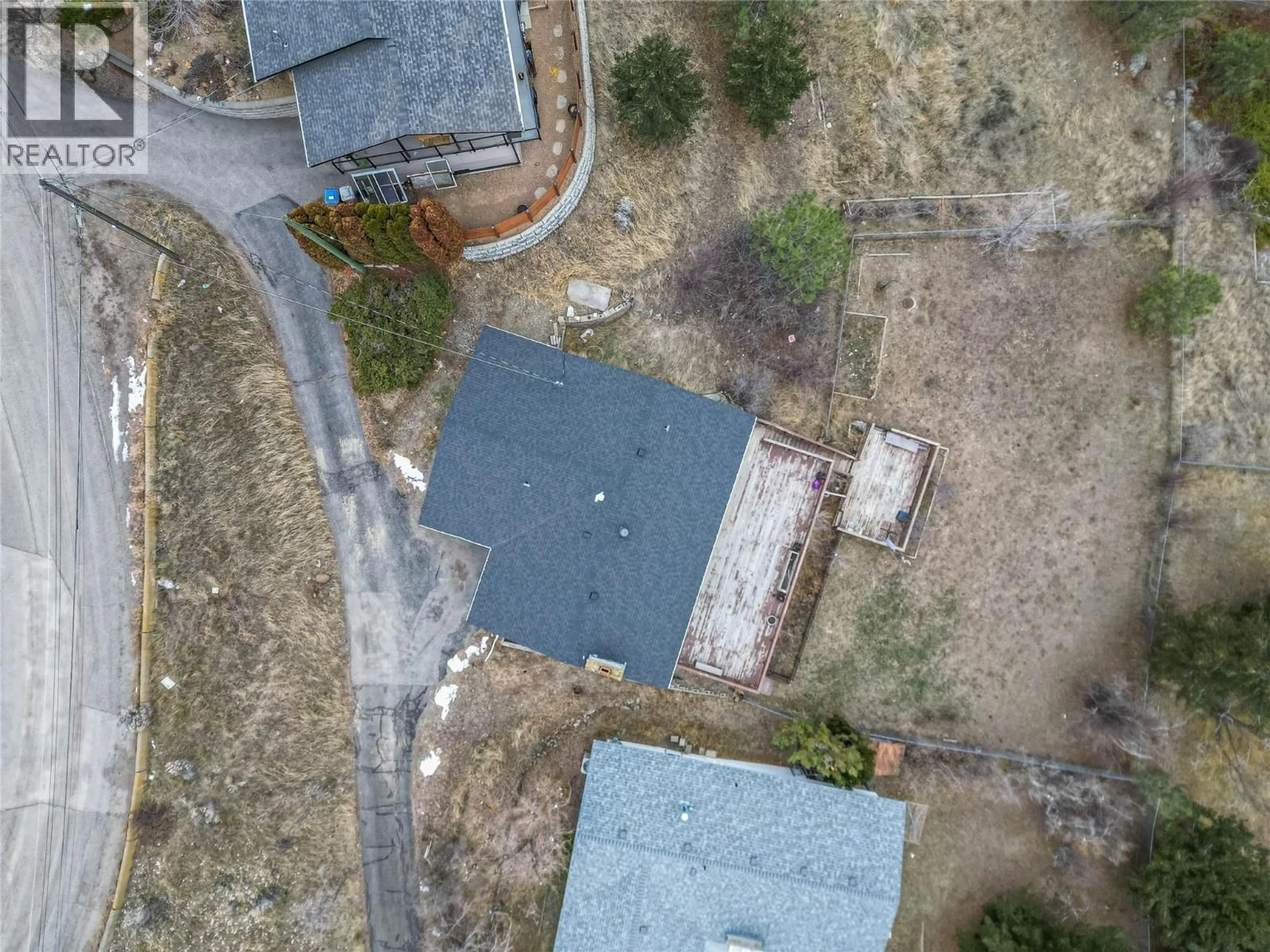 A pic from outside/outdoor area/front of a property/back of a property/a pic from drone, street for 1253 HIGHRIDGE DRIVE, Kamloops British Columbia V2C5G5