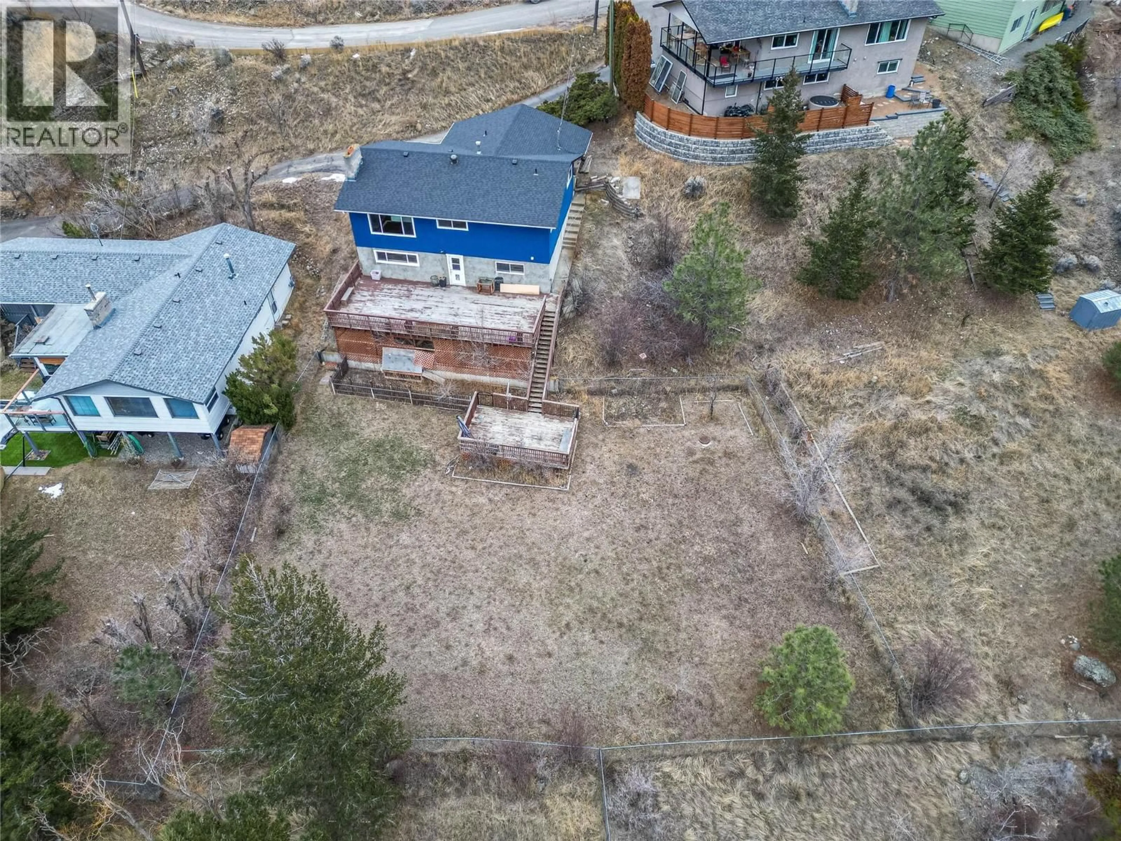 A pic from outside/outdoor area/front of a property/back of a property/a pic from drone, building for 1253 HIGHRIDGE DRIVE, Kamloops British Columbia V2C5G5