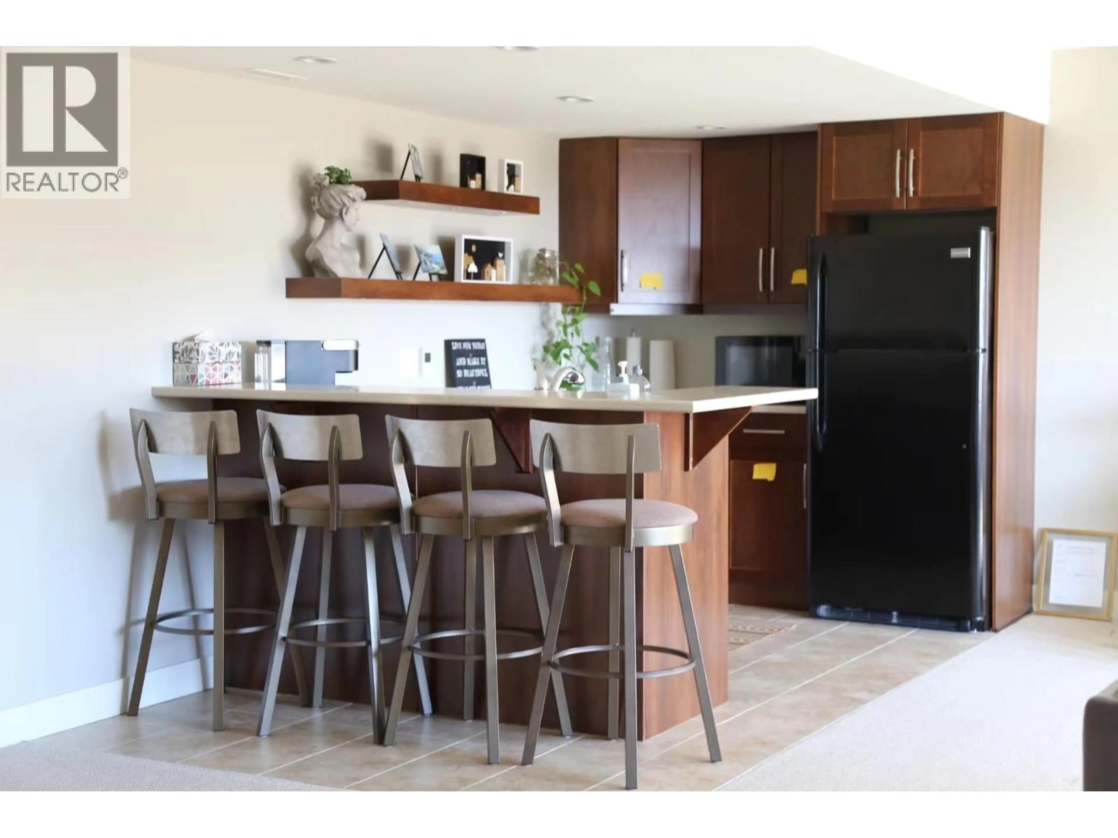 Open concept kitchen, ceramic/tile floor for 1243 FEEDHAM AVENUE, Kelowna British Columbia V1P1P5