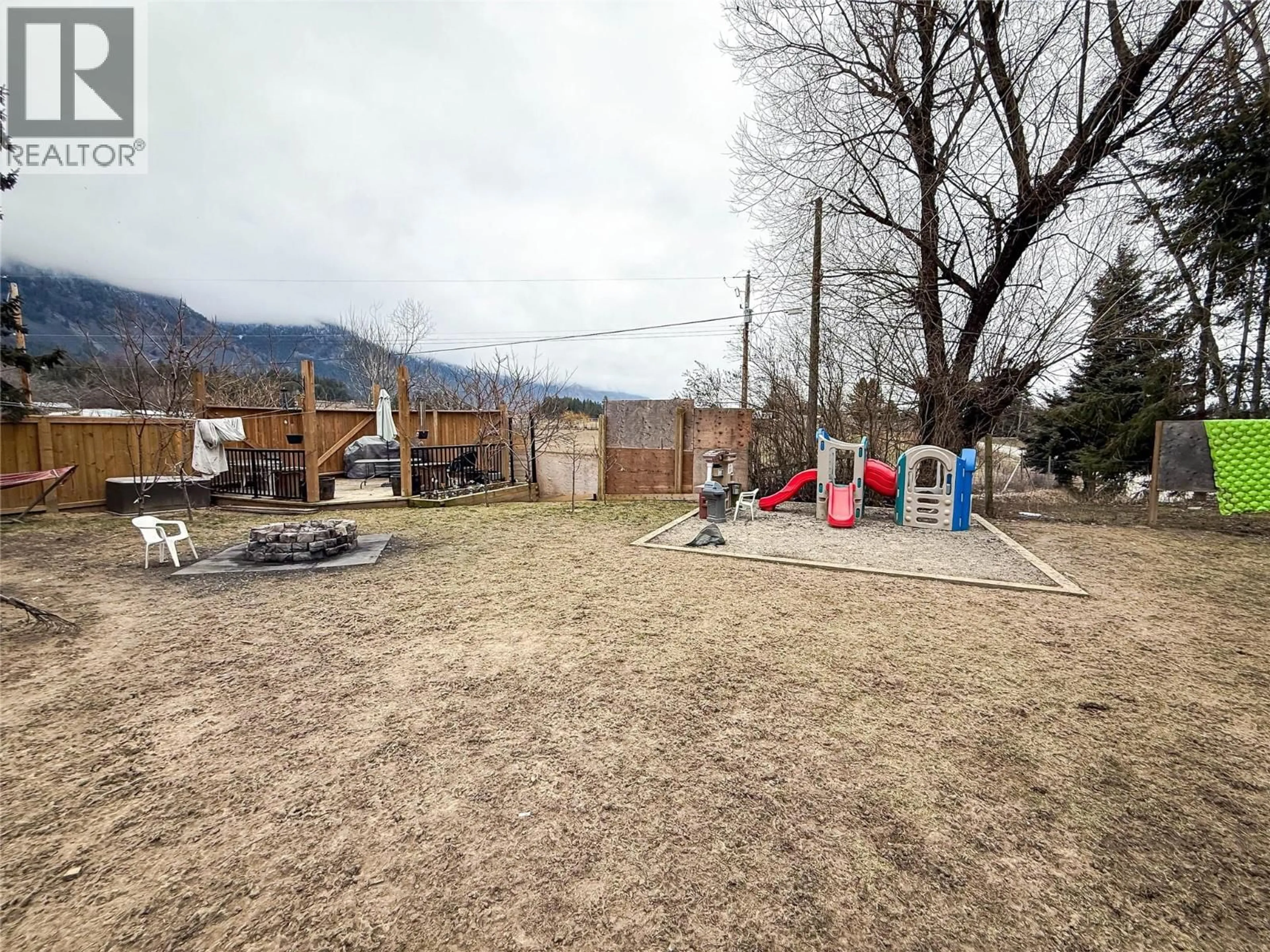 A pic from outside/outdoor area/front of a property/back of a property/a pic from drone, mountain view for 4114 51ST STREET, Canyon British Columbia V0B1C1