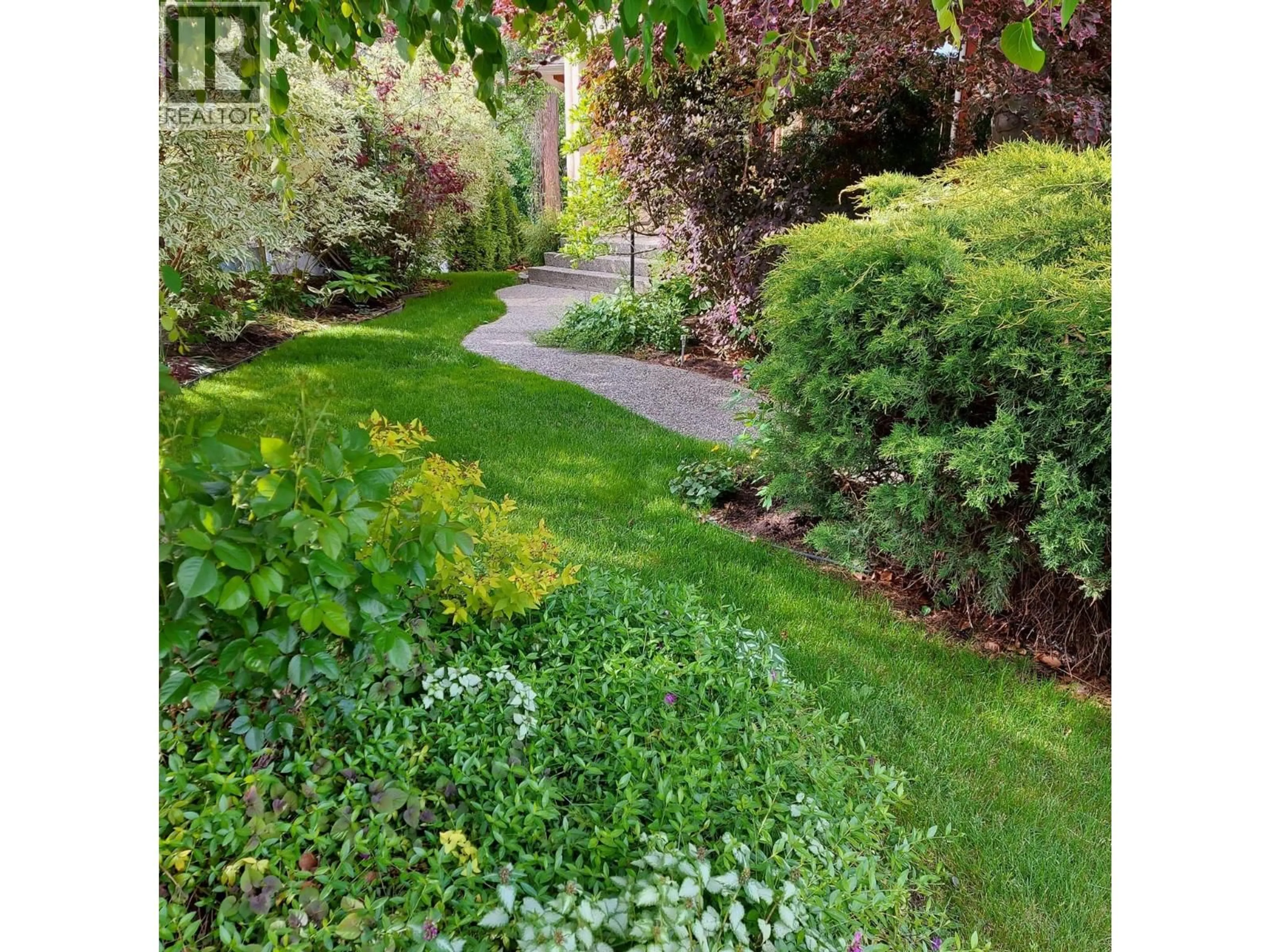 A pic from outside/outdoor area/front of a property/back of a property/a pic from drone, street for 3008 QUAIL CRESCENT, Kelowna British Columbia V1V1Z8