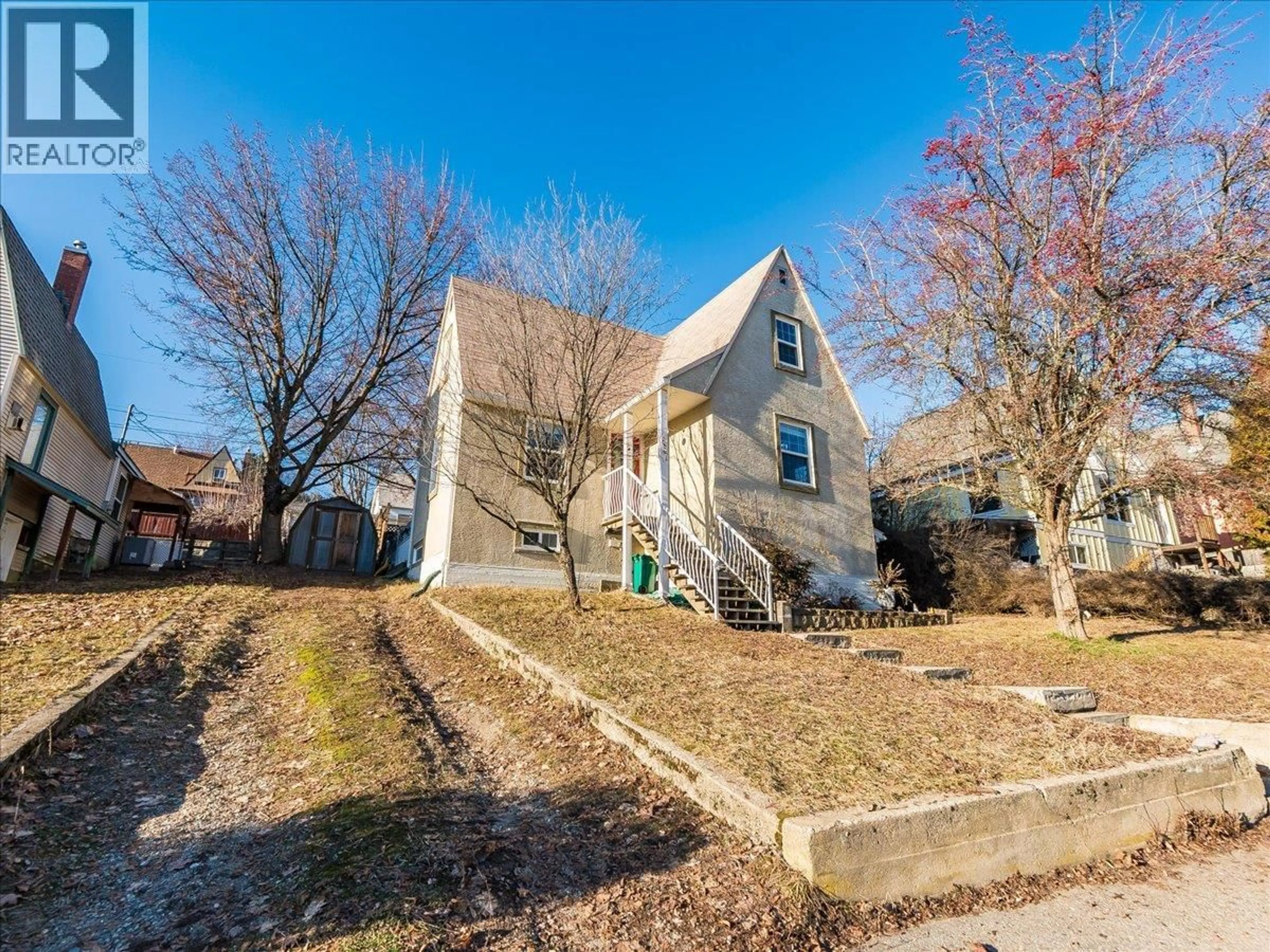 A pic from outside/outdoor area/front of a property/back of a property/a pic from drone, street for 657 SHAKESPERE STREET, Warfield British Columbia V1R2B1