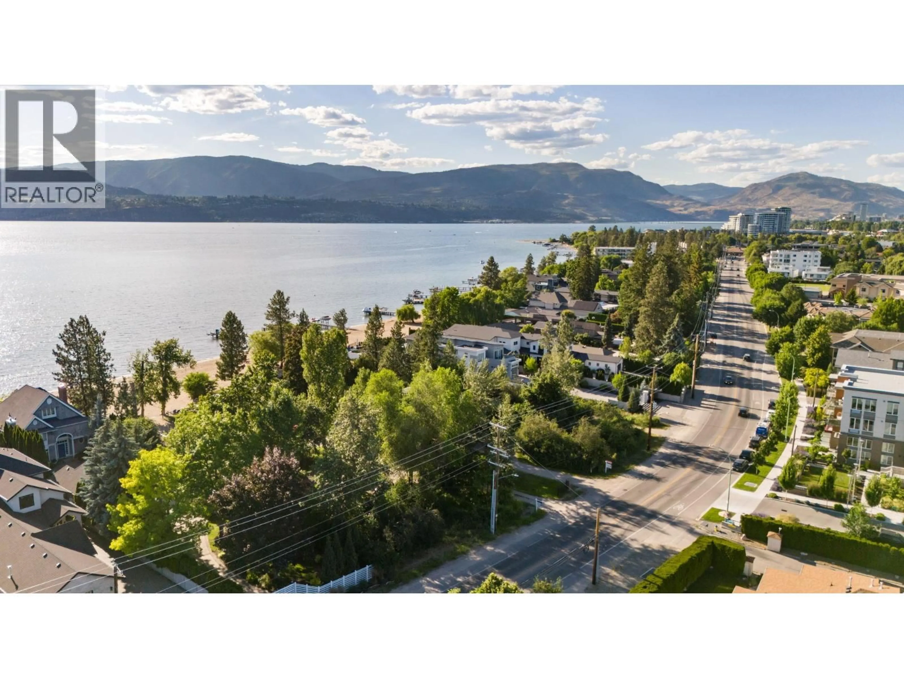 A pic from outside/outdoor area/front of a property/back of a property/a pic from drone, water/lake/river/ocean view for 4164 LAKESHORE ROAD, Kelowna British Columbia V1W1V9