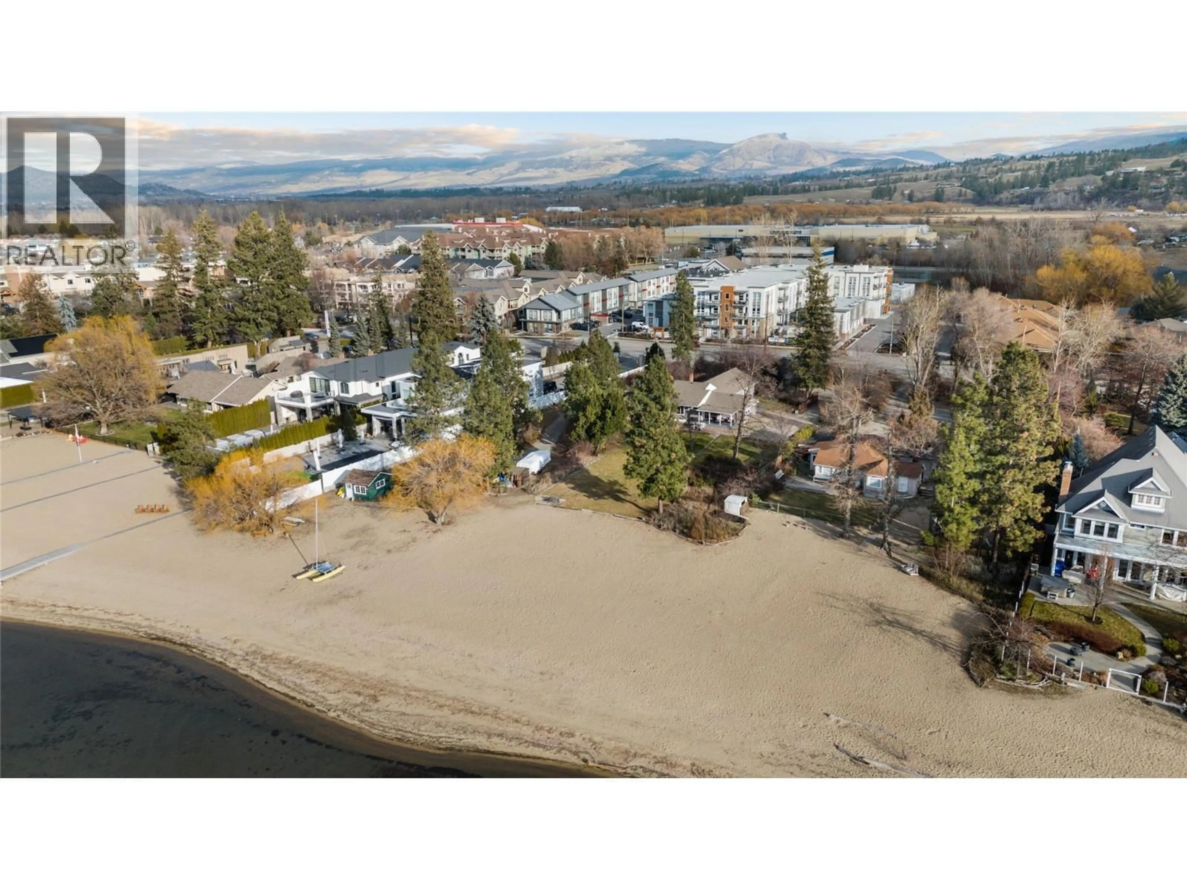 A pic from outside/outdoor area/front of a property/back of a property/a pic from drone, water/lake/river/ocean view for 4164 LAKESHORE ROAD, Kelowna British Columbia V1W1V9