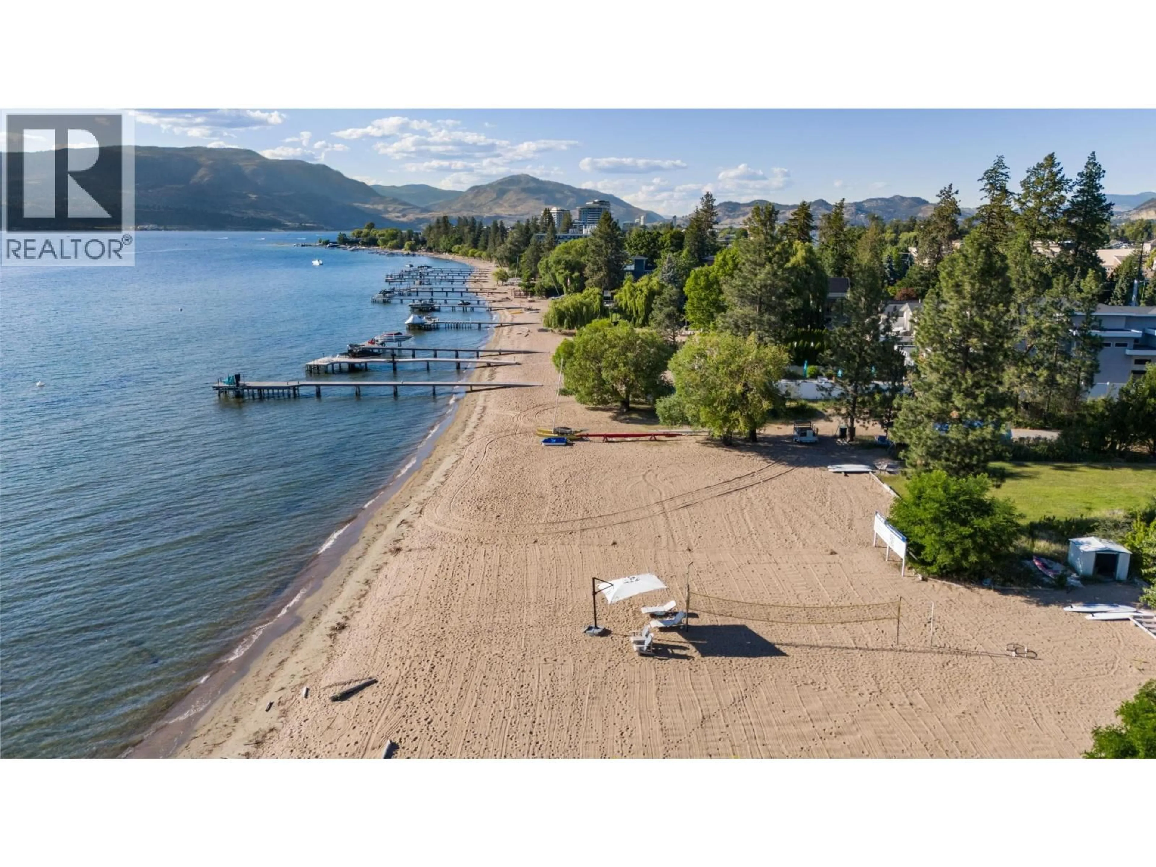 A pic from outside/outdoor area/front of a property/back of a property/a pic from drone, water/lake/river/ocean view for 4158 LAKESHORE ROAD, Kelowna British Columbia V1W1V9