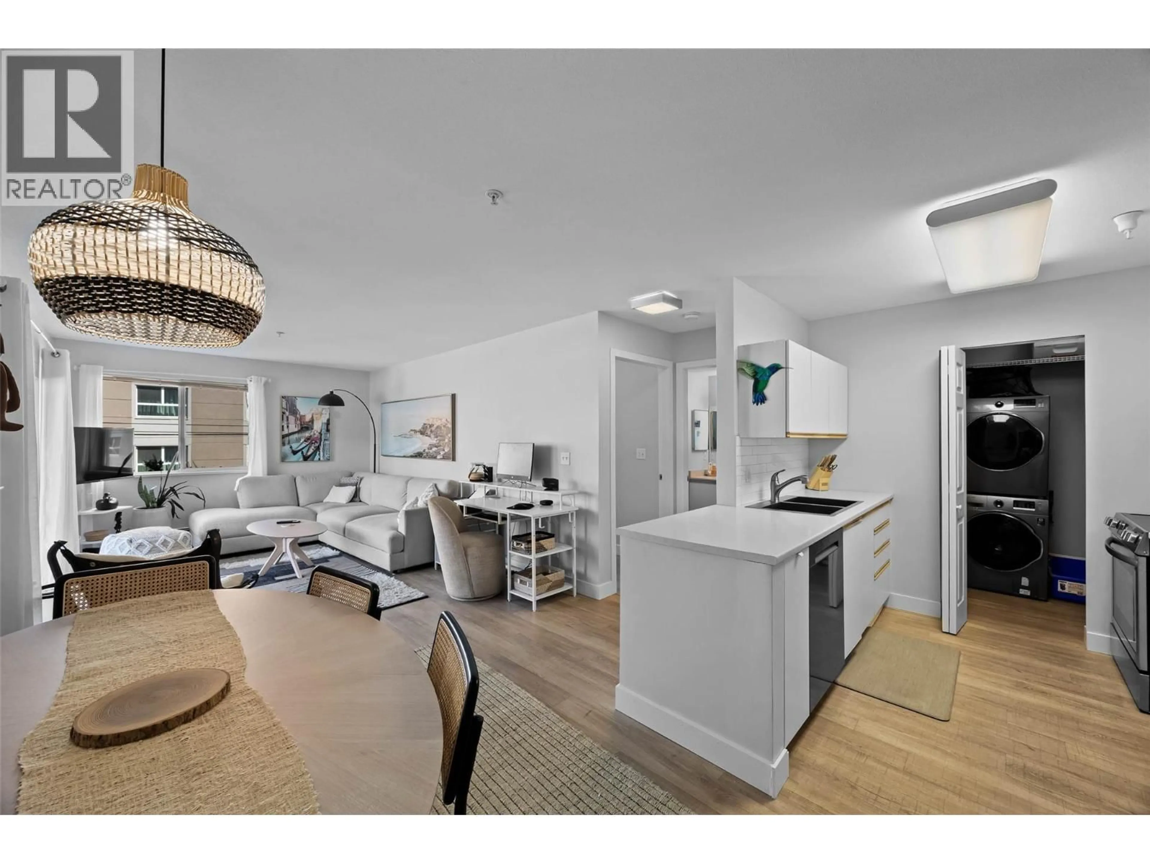 Open concept kitchen, wood/laminate floor for 204 - 360 BATTLE STREET, Kamloops British Columbia V2C2L6