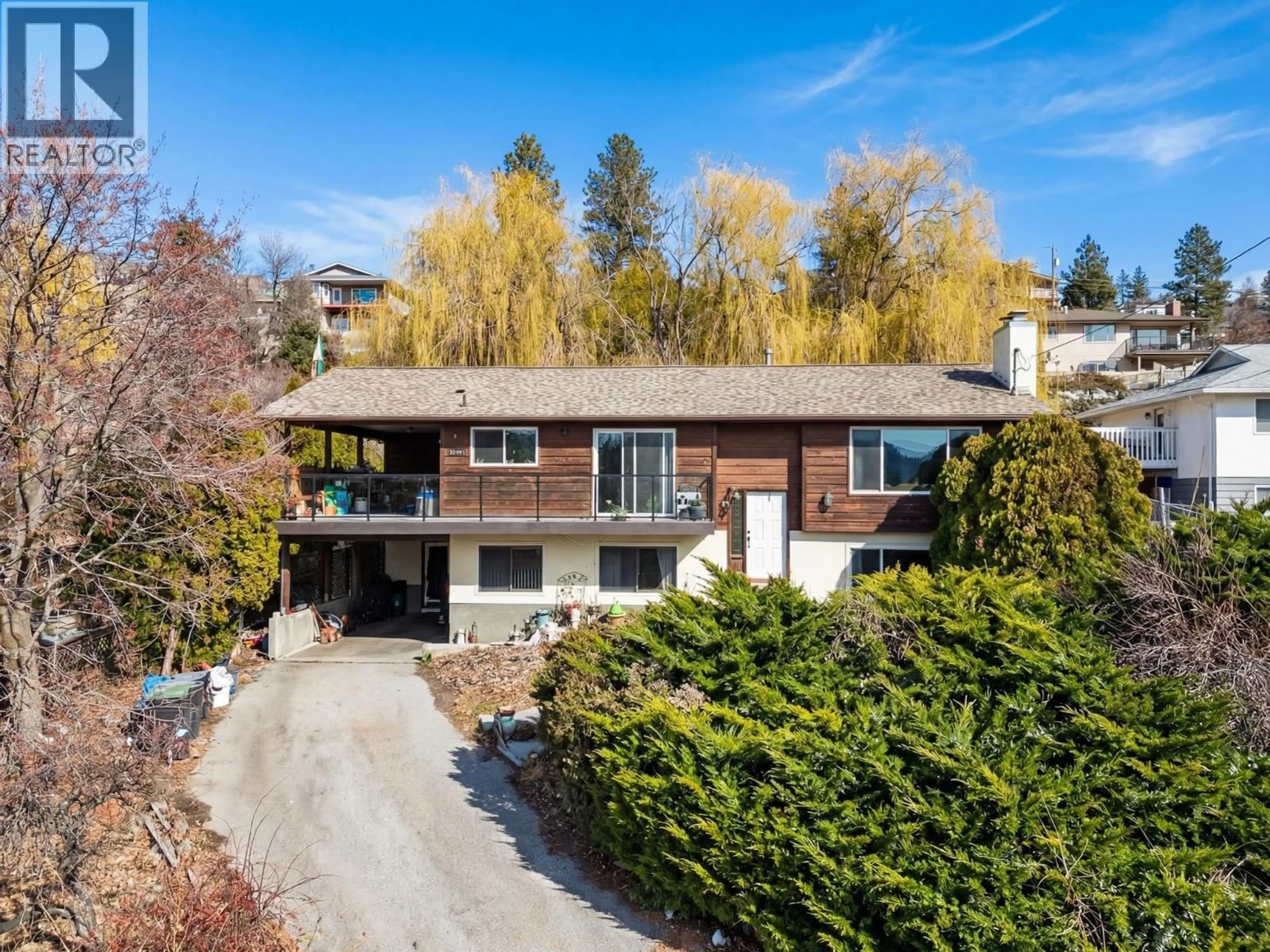 A pic from outside/outdoor area/front of a property/back of a property/a pic from drone, street for 10991 RUSSELL ROAD, Lake Country British Columbia V4V1W9