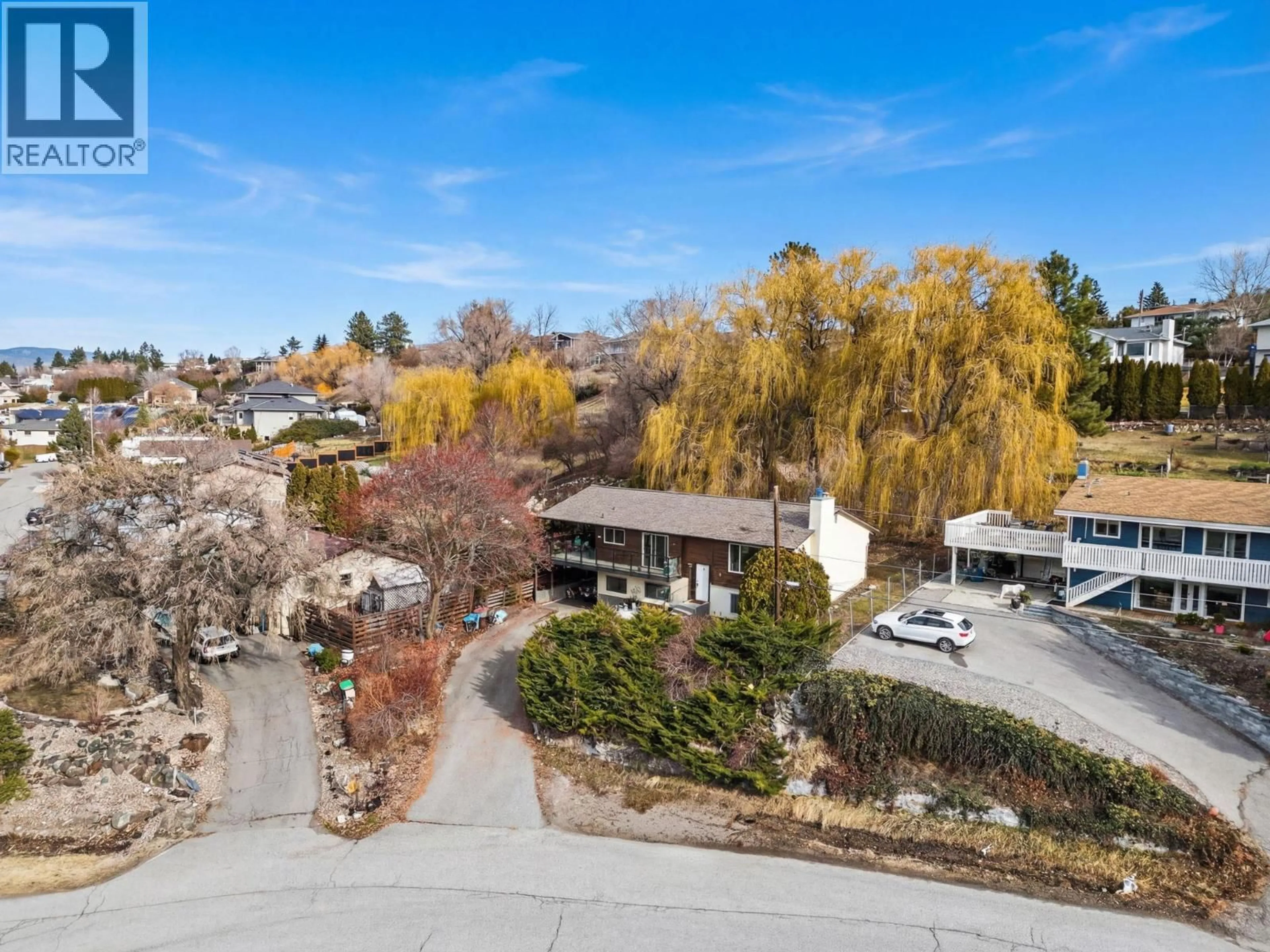 A pic from outside/outdoor area/front of a property/back of a property/a pic from drone, mountain view for 10991 RUSSELL ROAD, Lake Country British Columbia V4V1W9