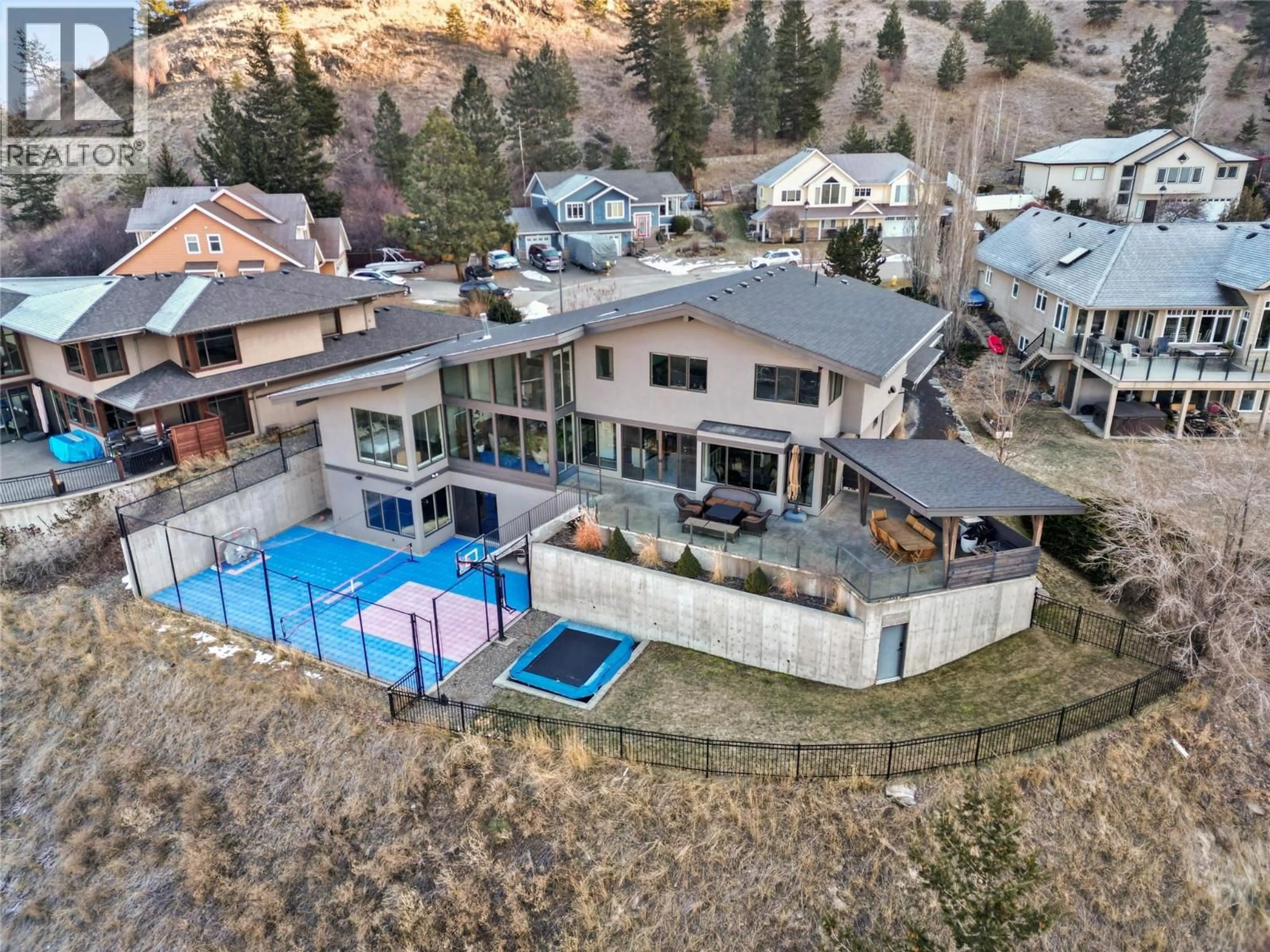 A pic from outside/outdoor area/front of a property/back of a property/a pic from drone, mountain view for 1555 KICKING HORSE WAY, Kamloops British Columbia V2E2T6