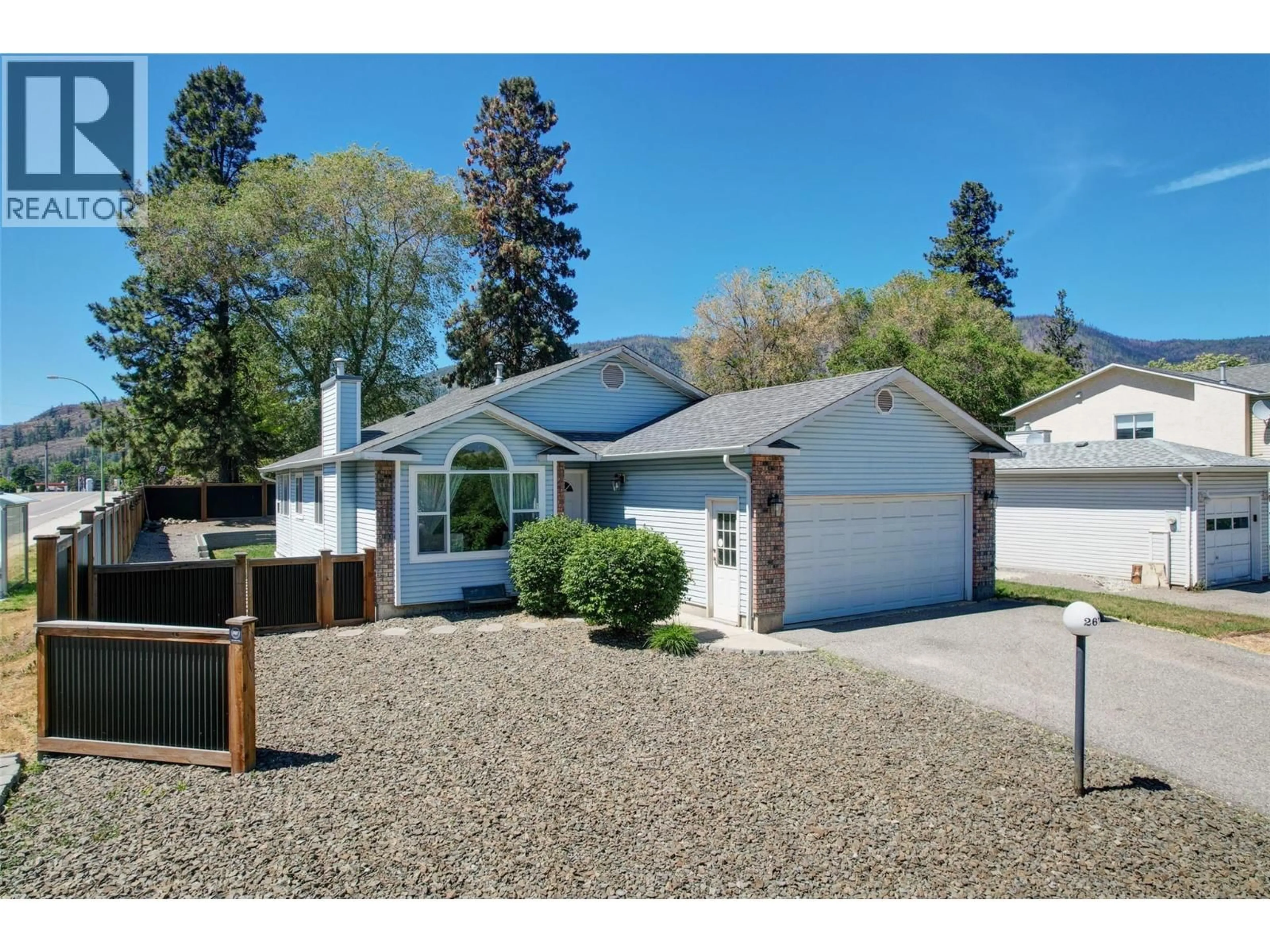 Home with vinyl exterior material, street for 2678 CAMERON ROAD, West Kelowna British Columbia V1Z3K9