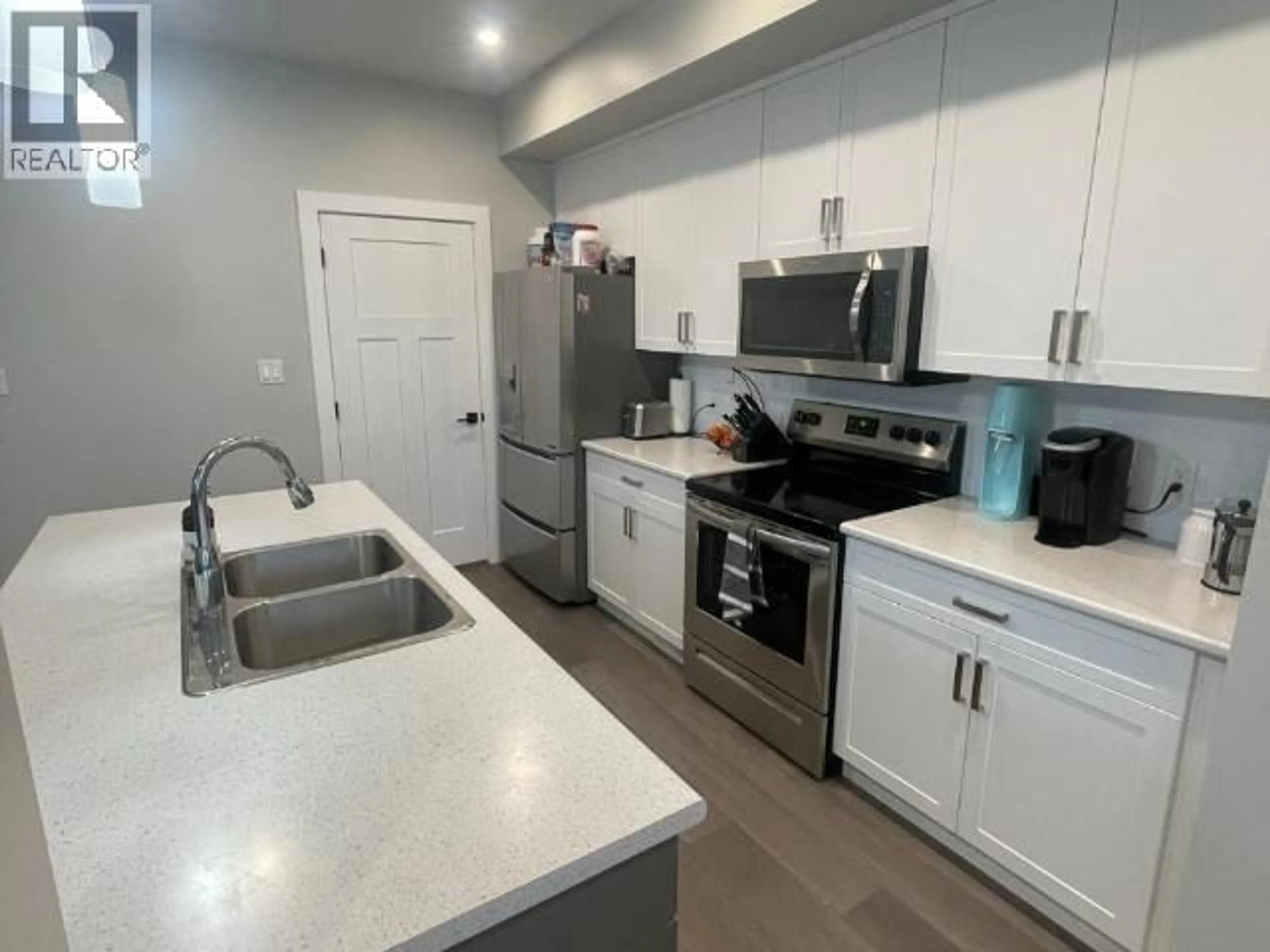 Open concept kitchen, ceramic/tile floor for 1611 PHILLIPS STREET, Merritt British Columbia V1K0B8