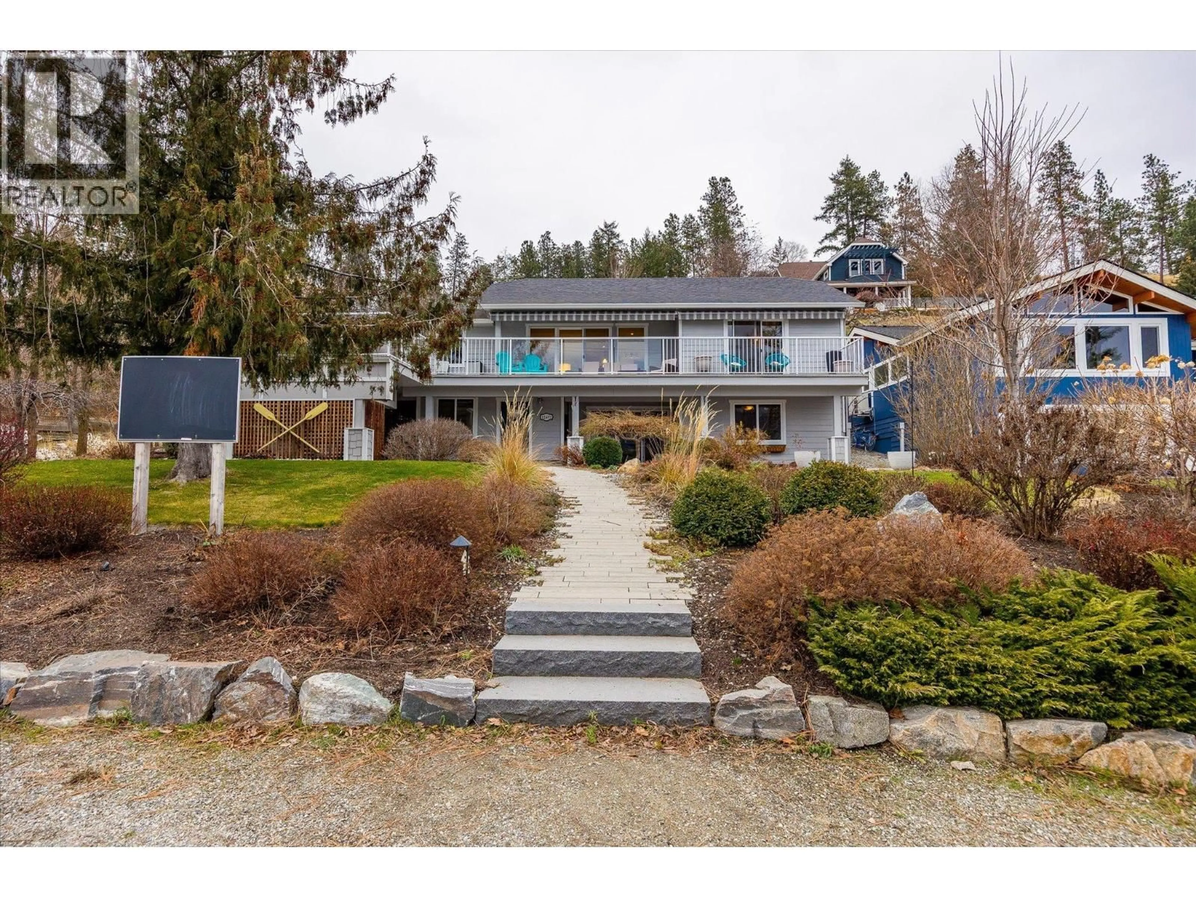 A pic from outside/outdoor area/front of a property/back of a property/a pic from drone, unknown for 11491 OKANAGAN CENTRE ROAD WEST, Lake Country British Columbia V4V2H2