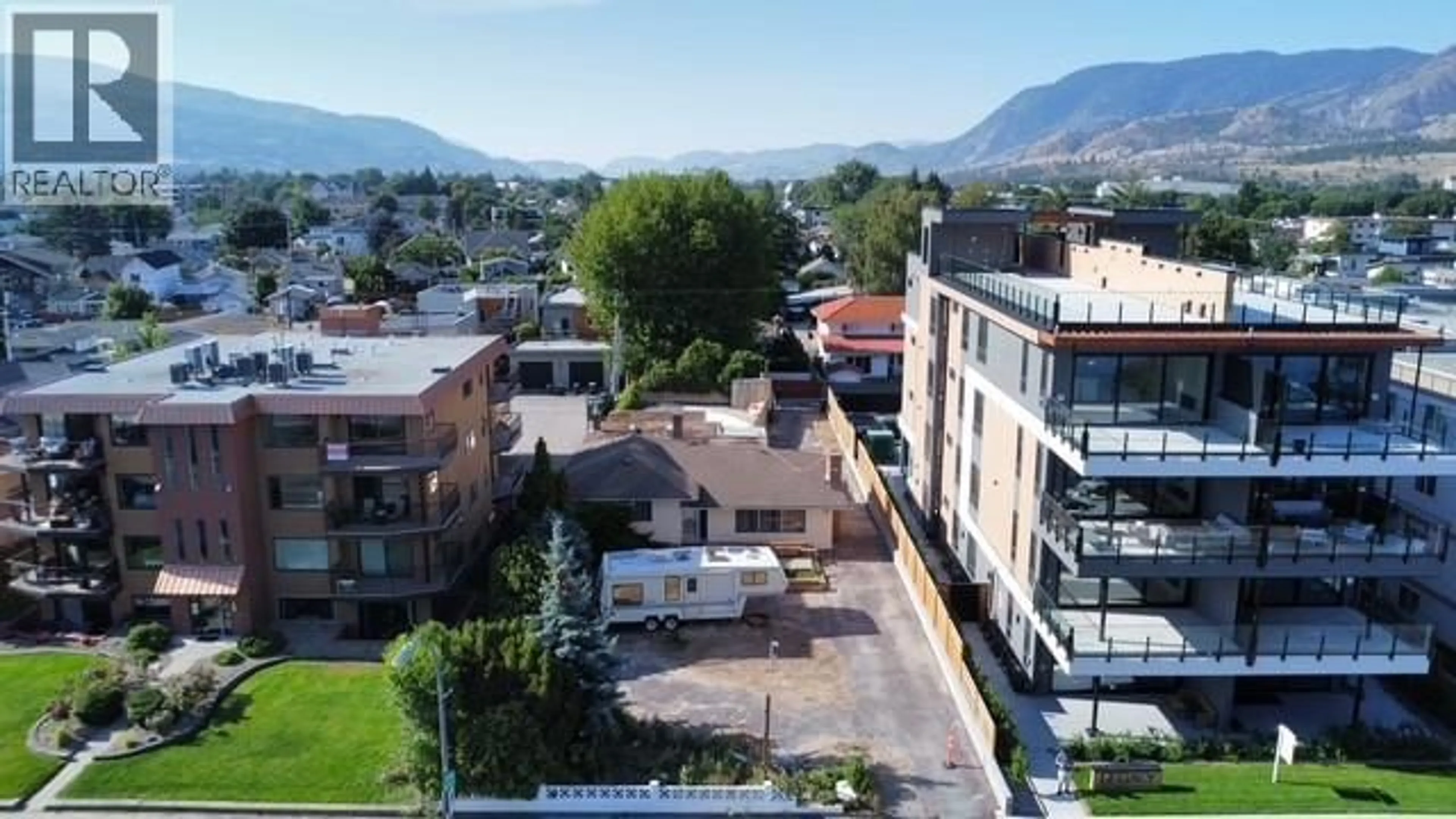 A pic from outside/outdoor area/front of a property/back of a property/a pic from drone, mountain view for 594 LAKESHORE DRIVE, Penticton British Columbia V2A1B9