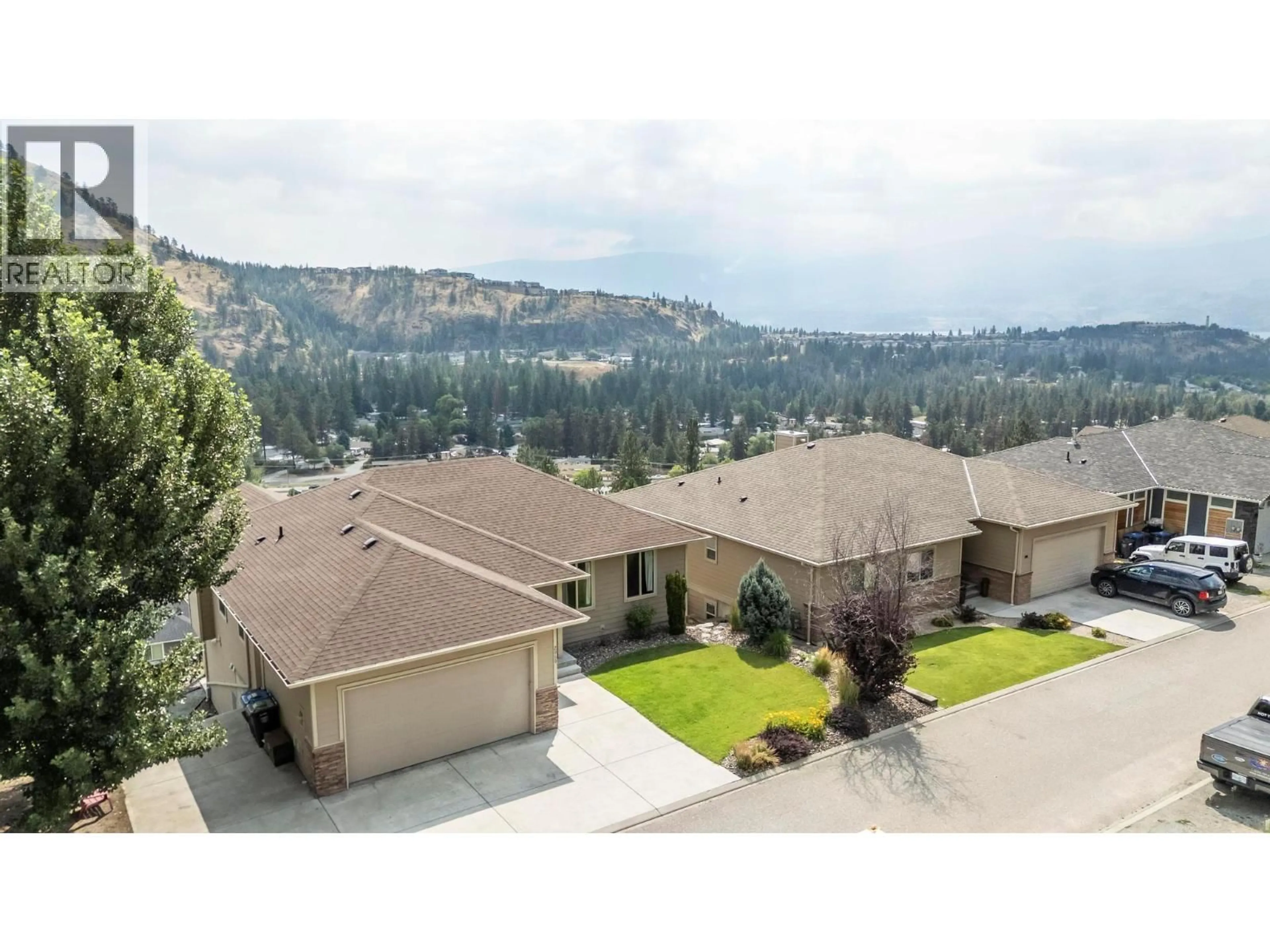 A pic from outside/outdoor area/front of a property/back of a property/a pic from drone, mountain view for 2969 ENSIGN LANE, West Kelowna British Columbia V4T2Z4
