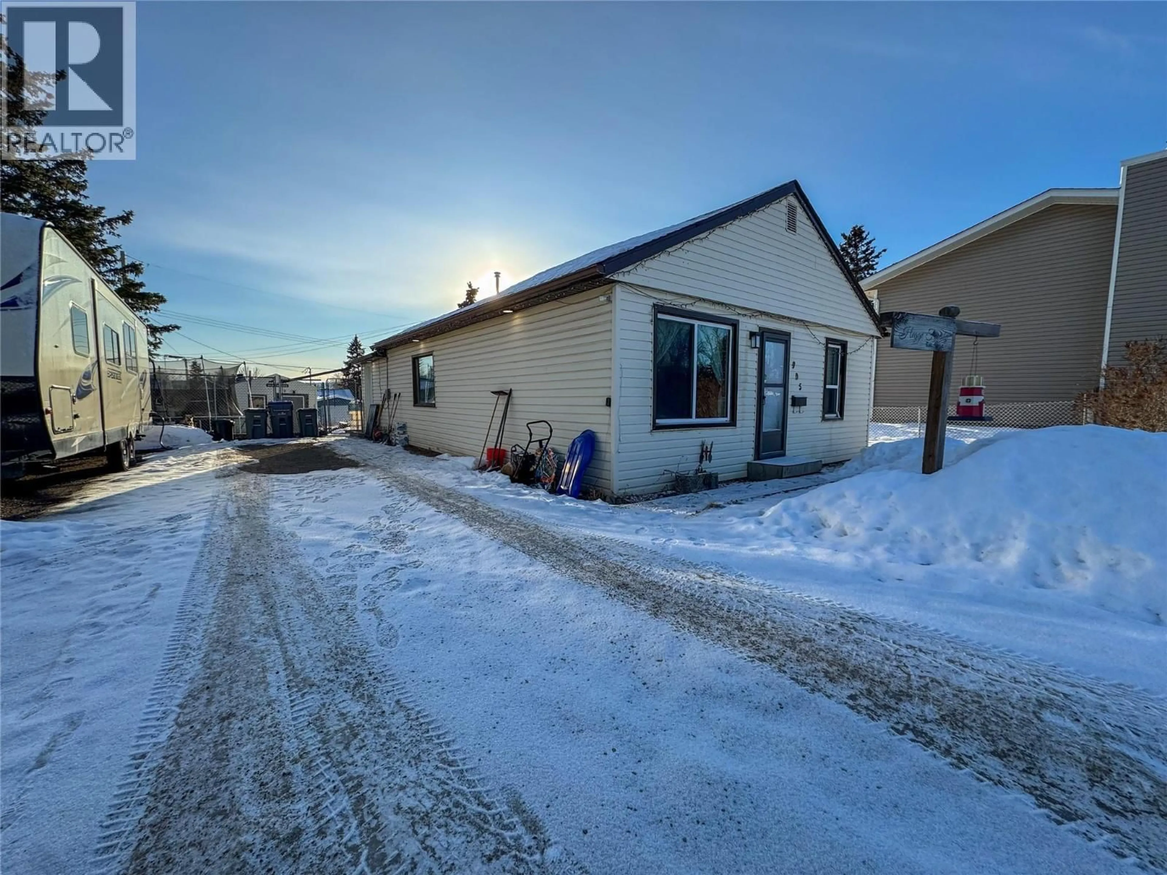 A pic from outside/outdoor area/front of a property/back of a property/a pic from drone, street for 905 91 AVENUE, Dawson Creek British Columbia V1G1A9