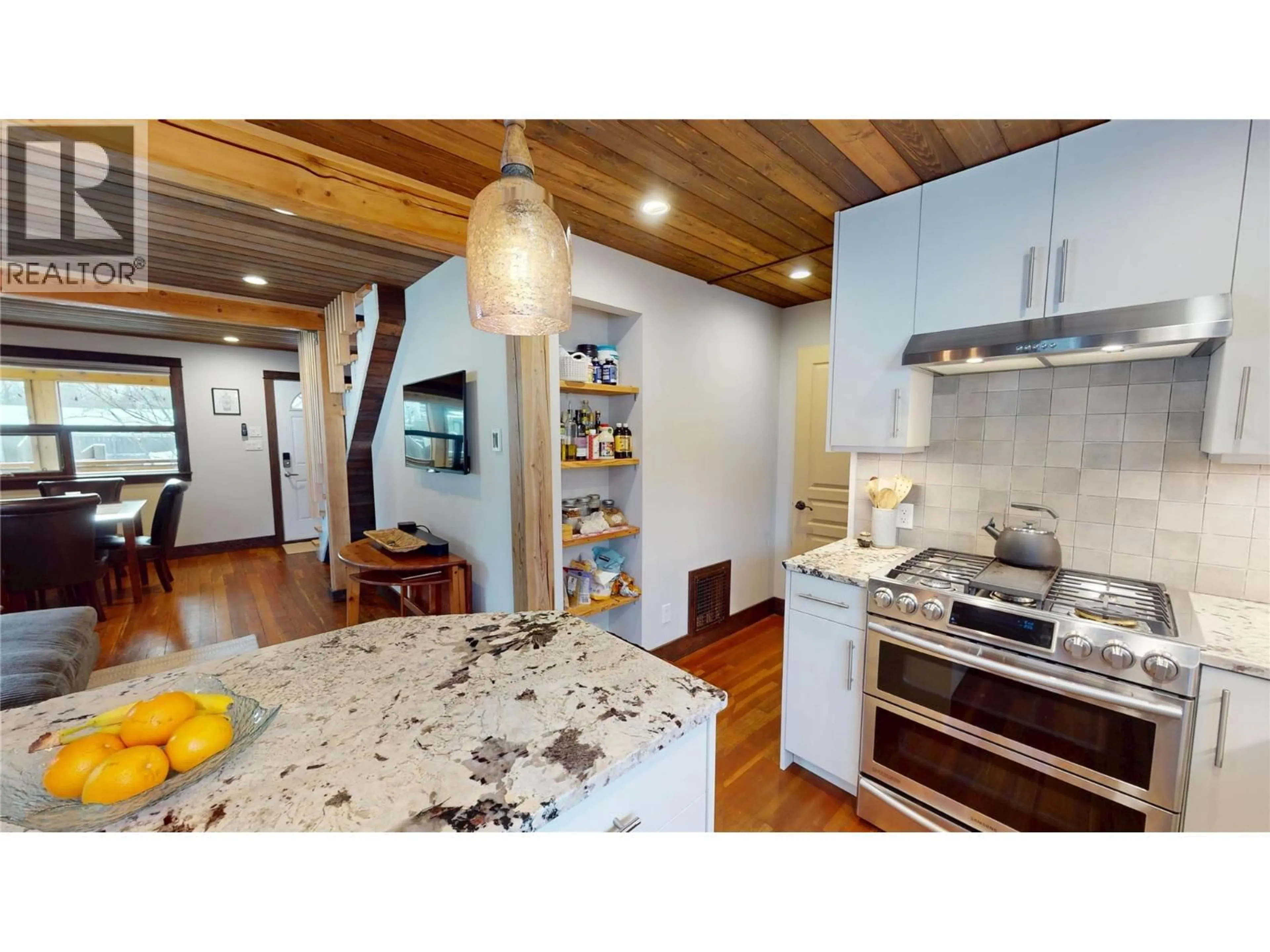 Open concept kitchen, wood/laminate floor for 402A 6TH AVENUE, Fernie British Columbia V0B1M0