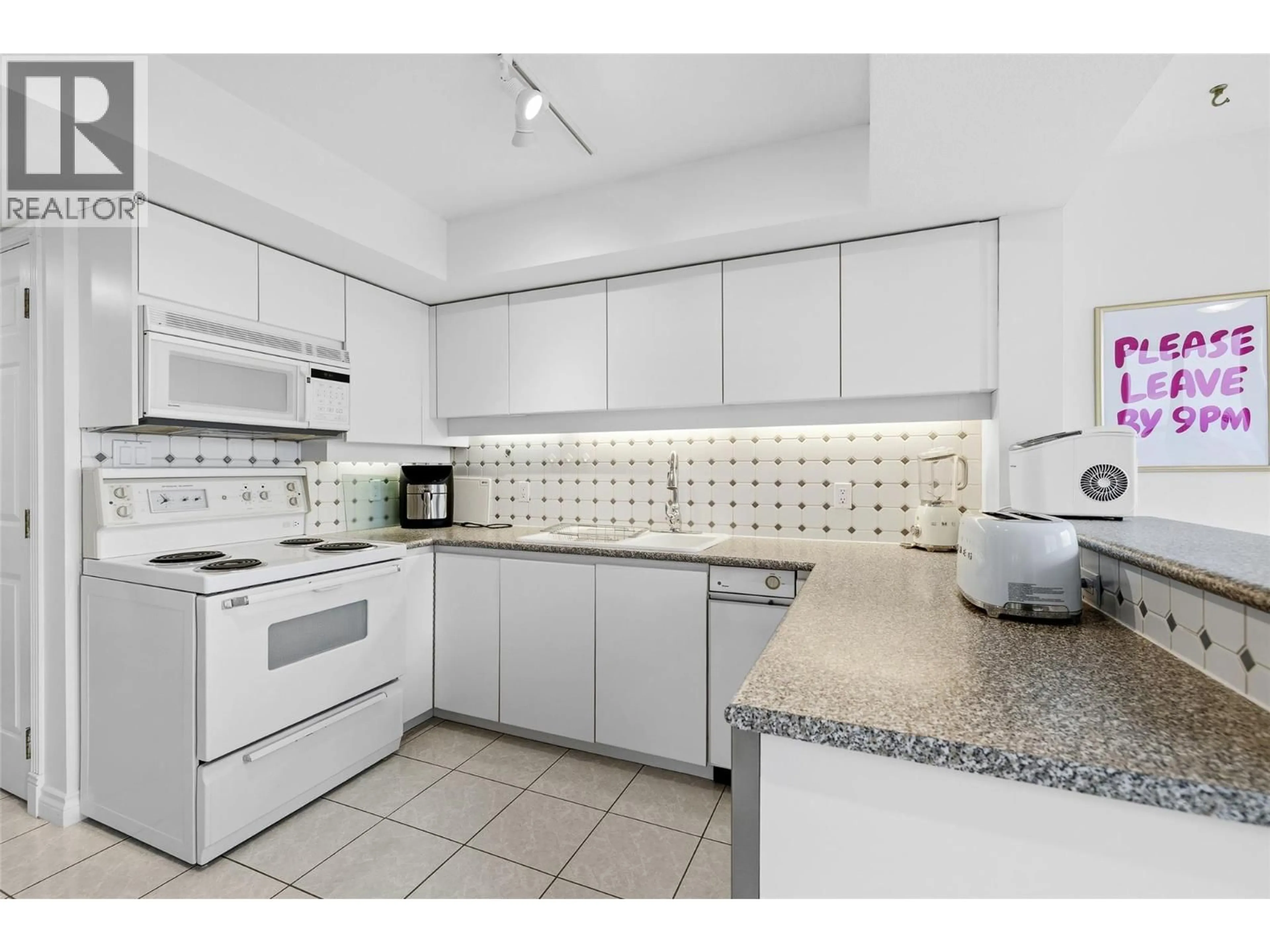 Standard kitchen, ceramic/tile floor for 901 - 1160 SUNSET DRIVE, Kelowna British Columbia V1Y9P7