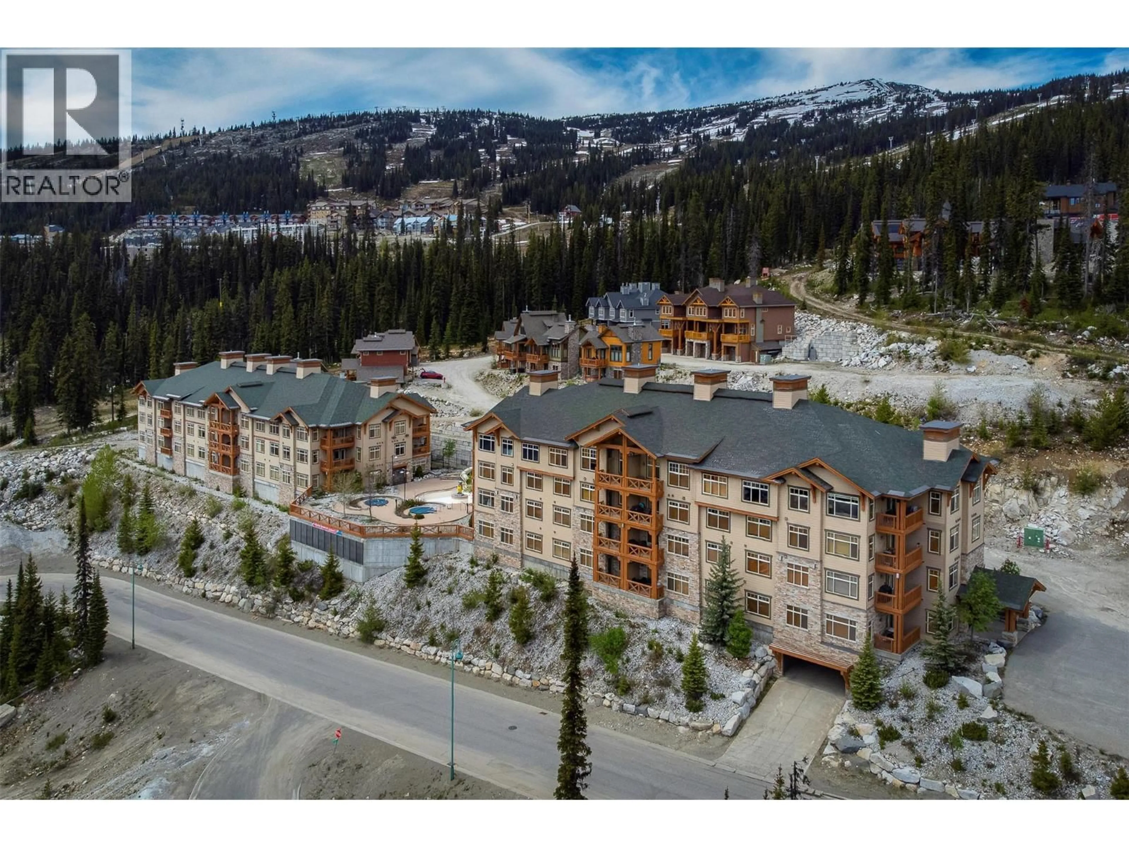 A pic from outside/outdoor area/front of a property/back of a property/a pic from drone, mountain view for 222 - 255 FEATHERTOP WAY, Big White British Columbia V0H1A0