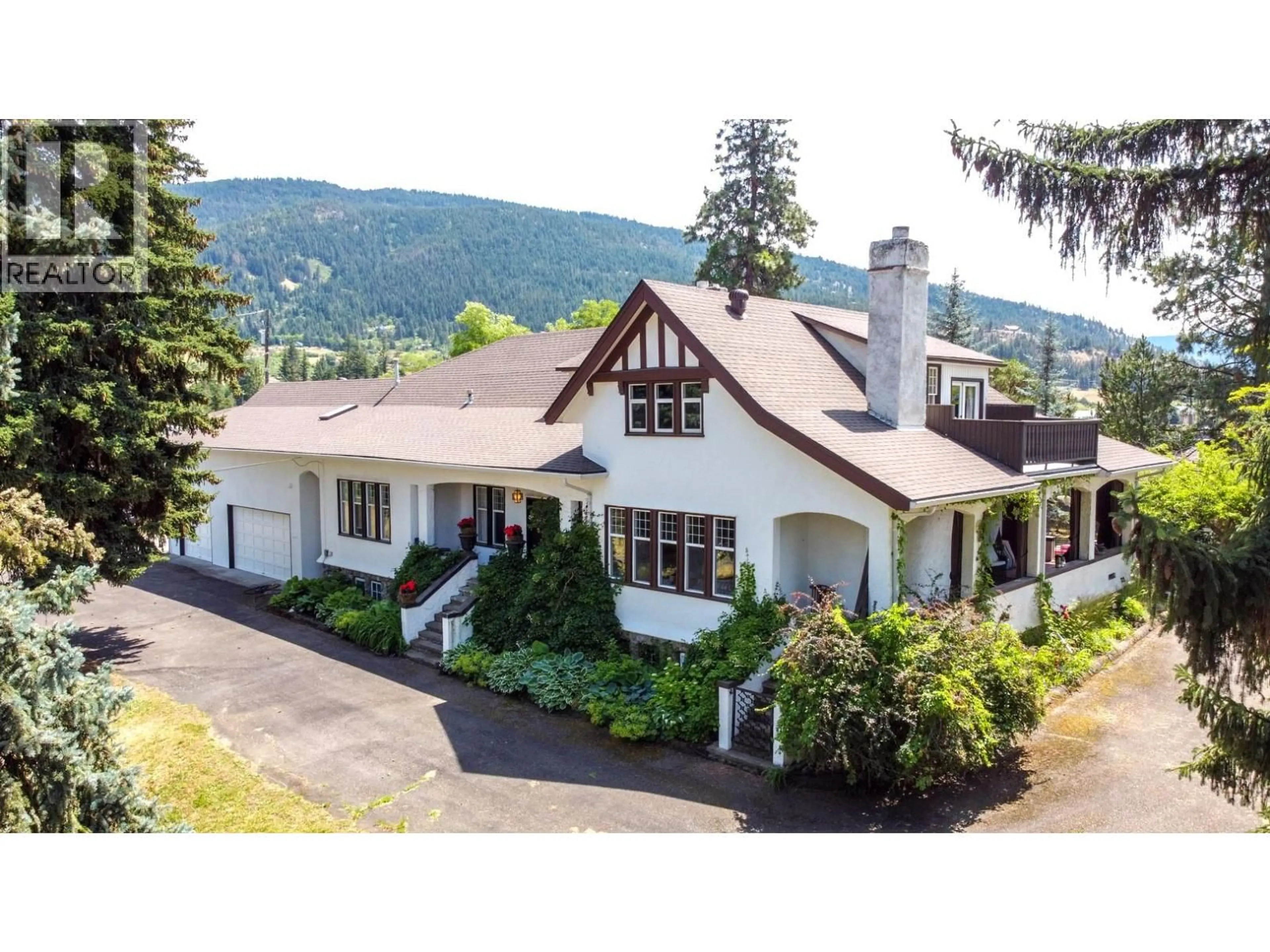 A pic from outside/outdoor area/front of a property/back of a property/a pic from drone, mountain view for 5482 SILVER STAR ROAD, Vernon British Columbia V1B3K4
