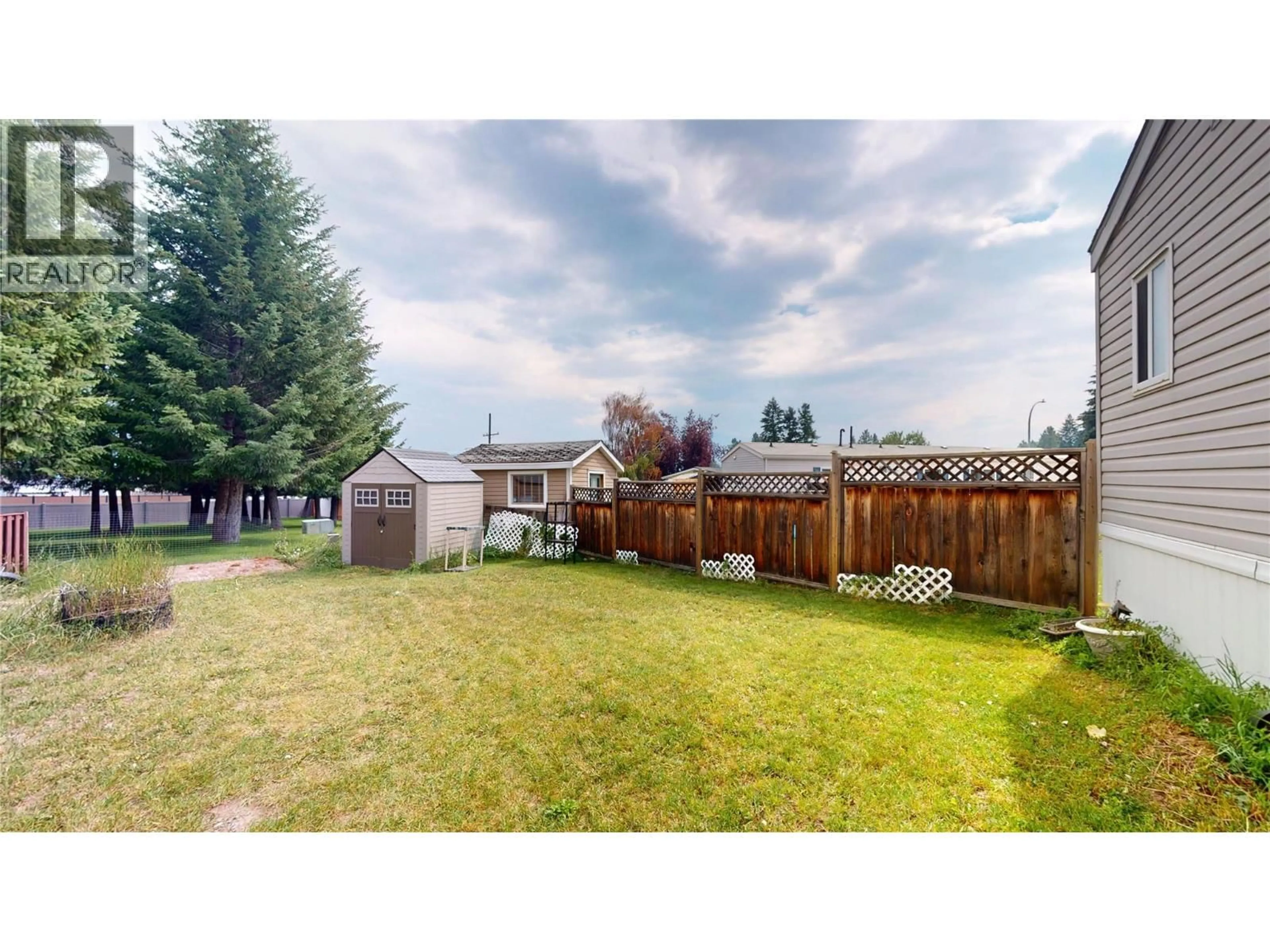 A pic from outside/outdoor area/front of a property/back of a property/a pic from drone, mountain view for 40 - 2321 INDUSTRIAL 2 ROAD, Cranbrook British Columbia V1C6H3