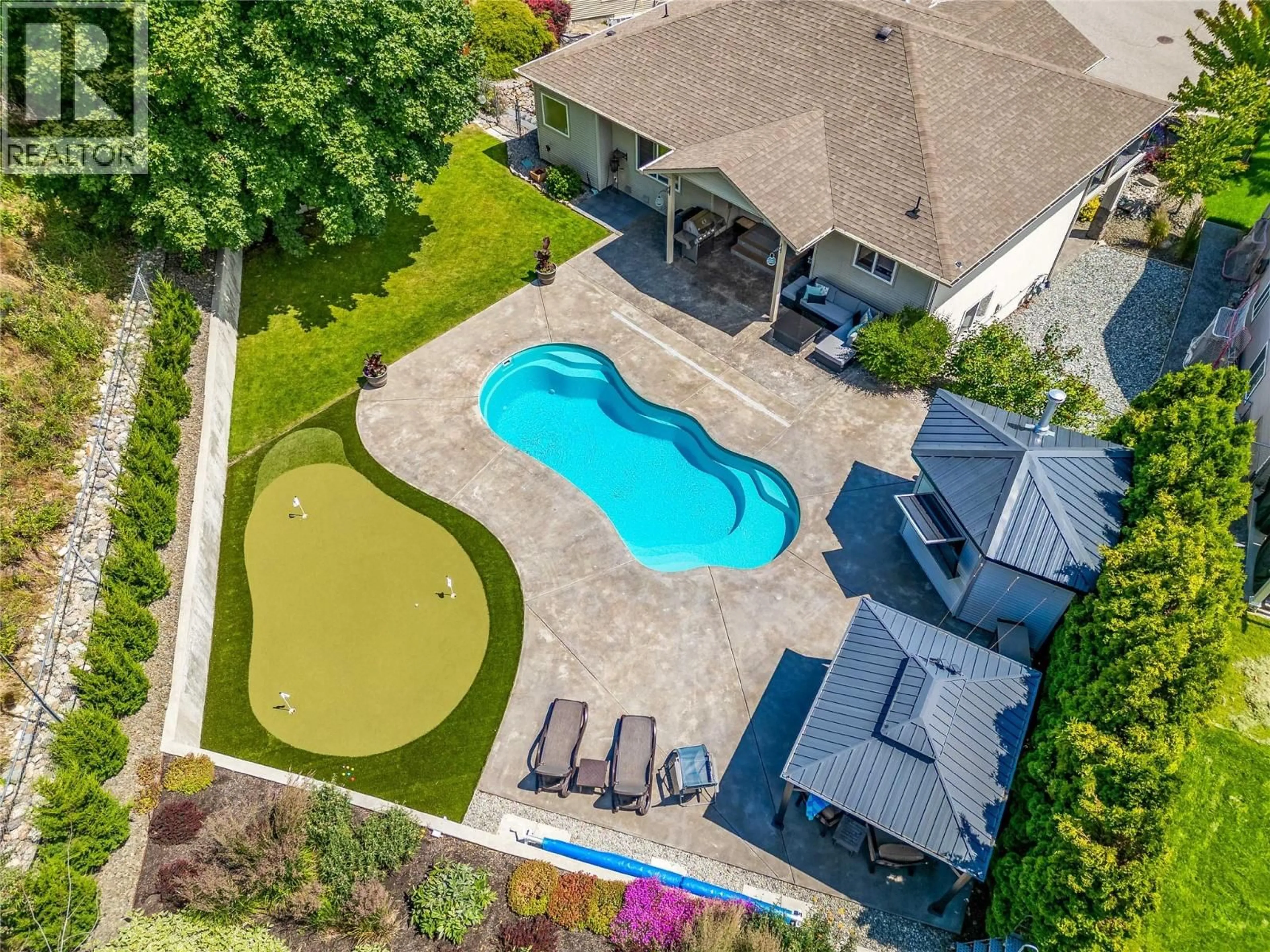 A pic from outside/outdoor area/front of a property/back of a property/a pic from drone, water/lake/river/ocean view for 1492 LONGLEY CRESCENT, Kelowna British Columbia V1P1M8