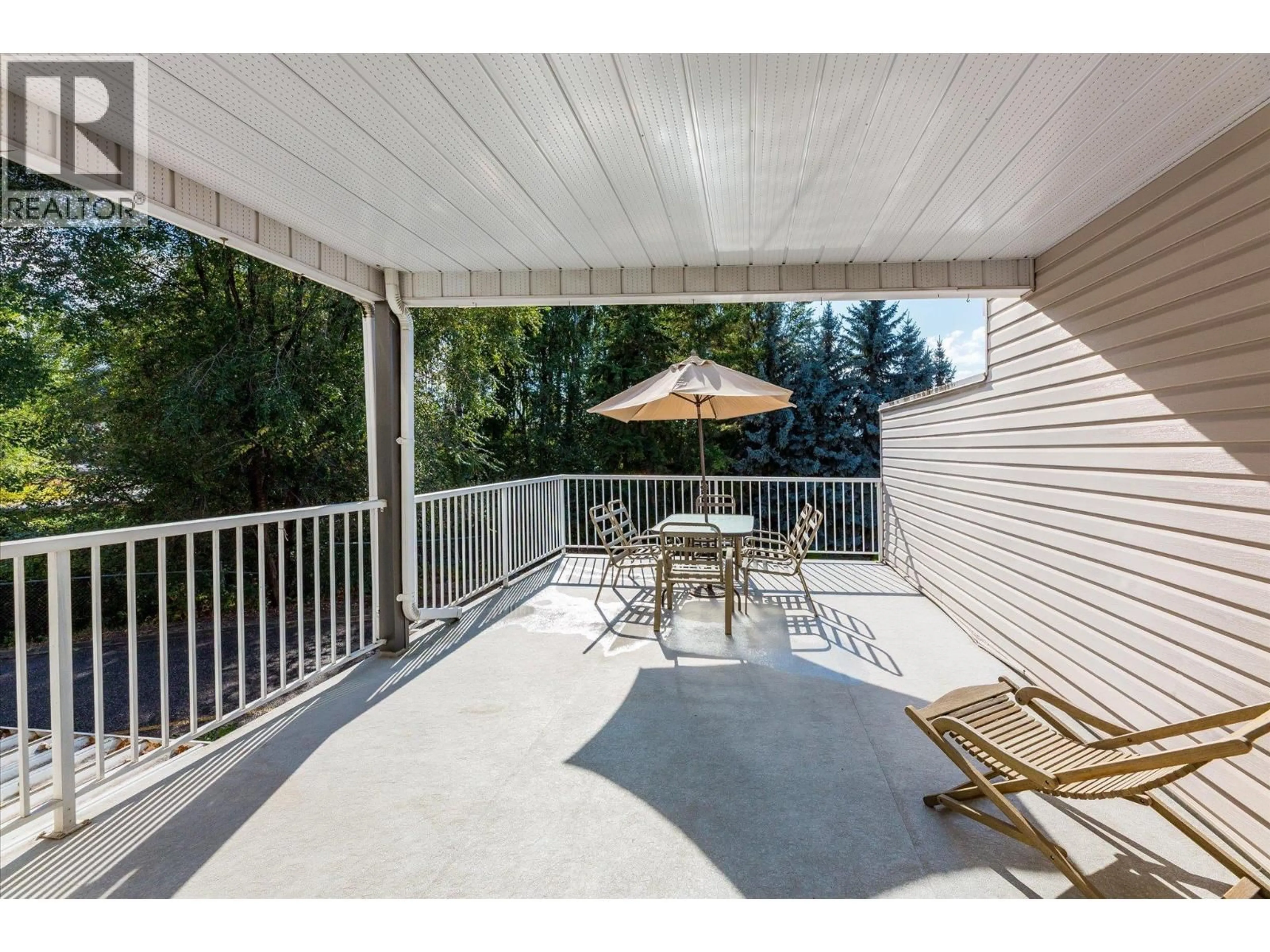 Patio, water/lake/river/ocean view for 6 - 4404 PLEASANT VALLEY ROAD, Vernon British Columbia V1T4M3