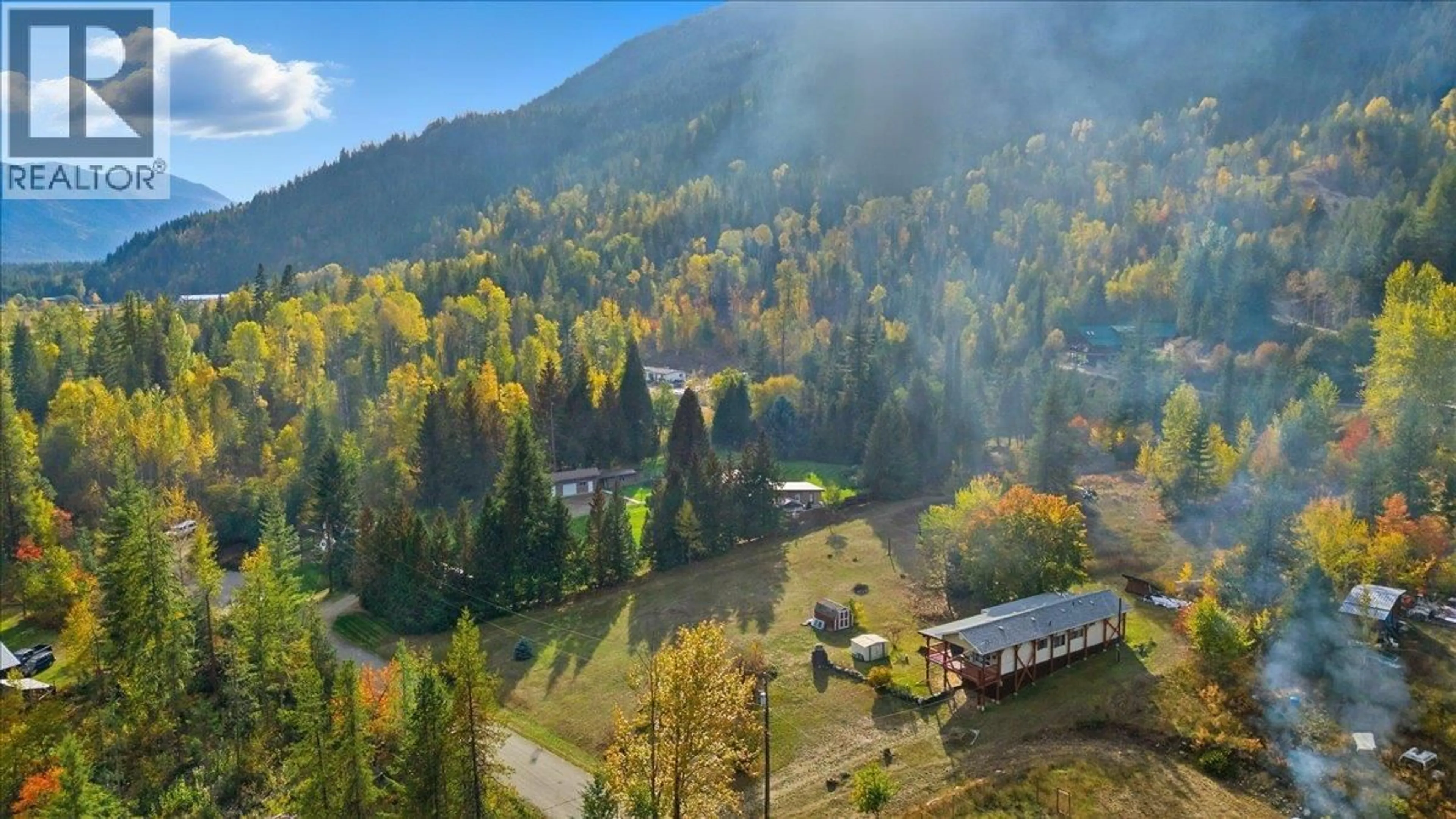 A pic from outside/outdoor area/front of a property/back of a property/a pic from drone, mountain view for 2413 DOUKHOBOUR ROAD, Castlegar British Columbia V1N4P2