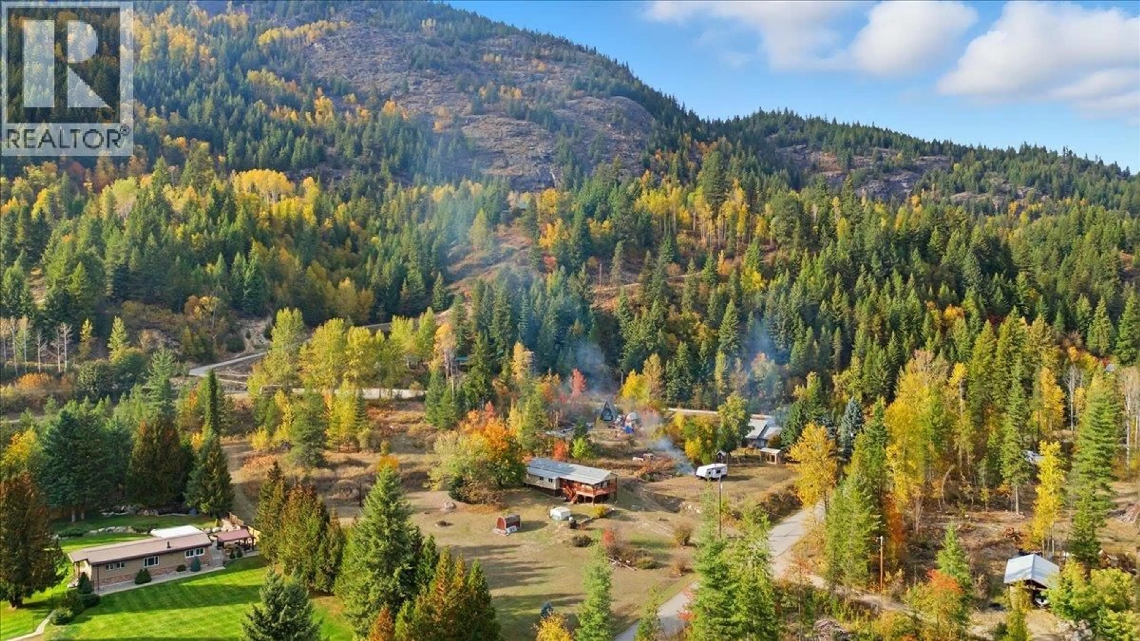 A pic from outside/outdoor area/front of a property/back of a property/a pic from drone, mountain view for 2413 DOUKHOBOUR ROAD, Castlegar British Columbia V1N4P2