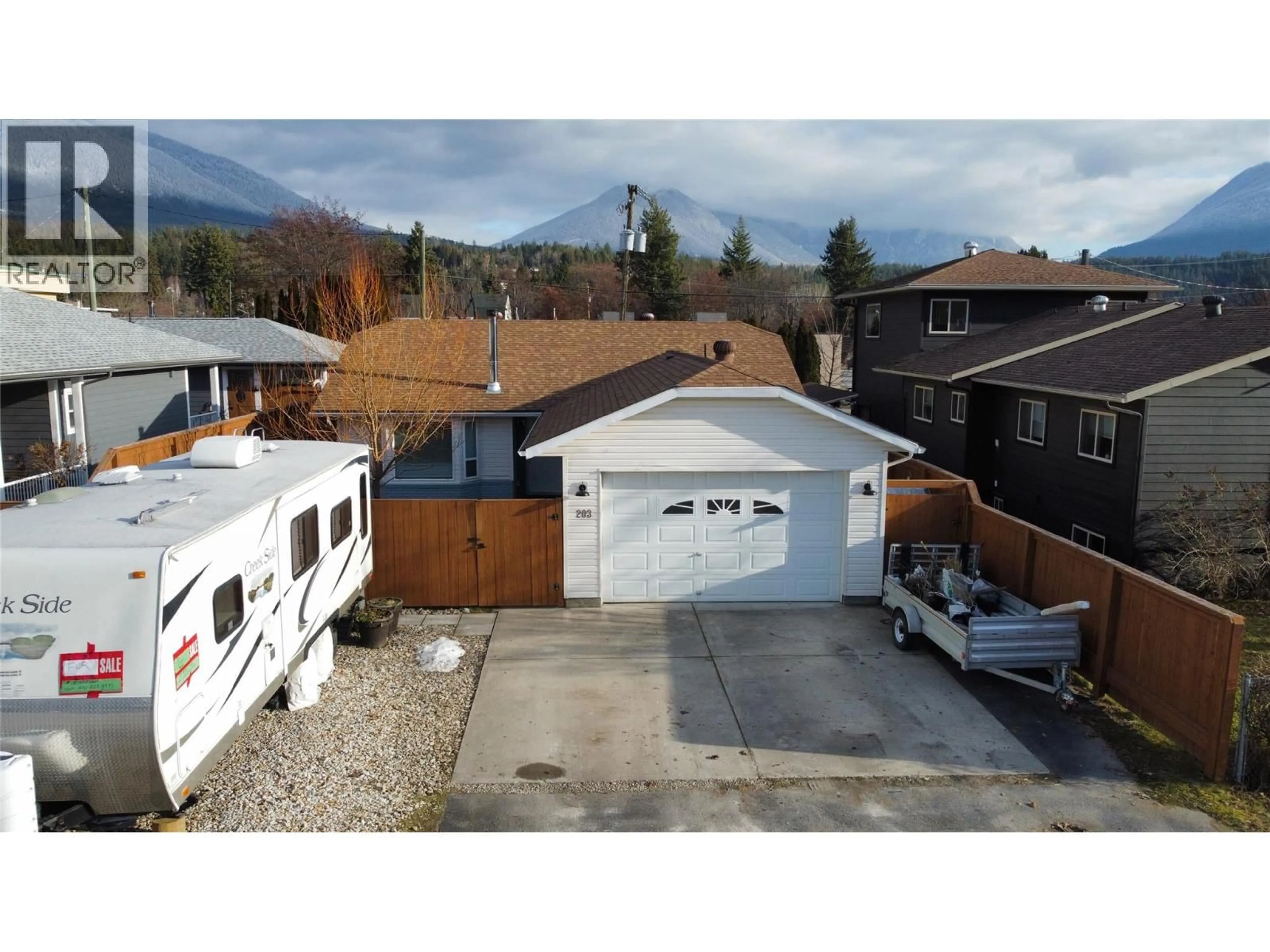 A pic from outside/outdoor area/front of a property/back of a property/a pic from drone, mountain view for 203 7TH AVENUE, Nakusp British Columbia V0G1R0