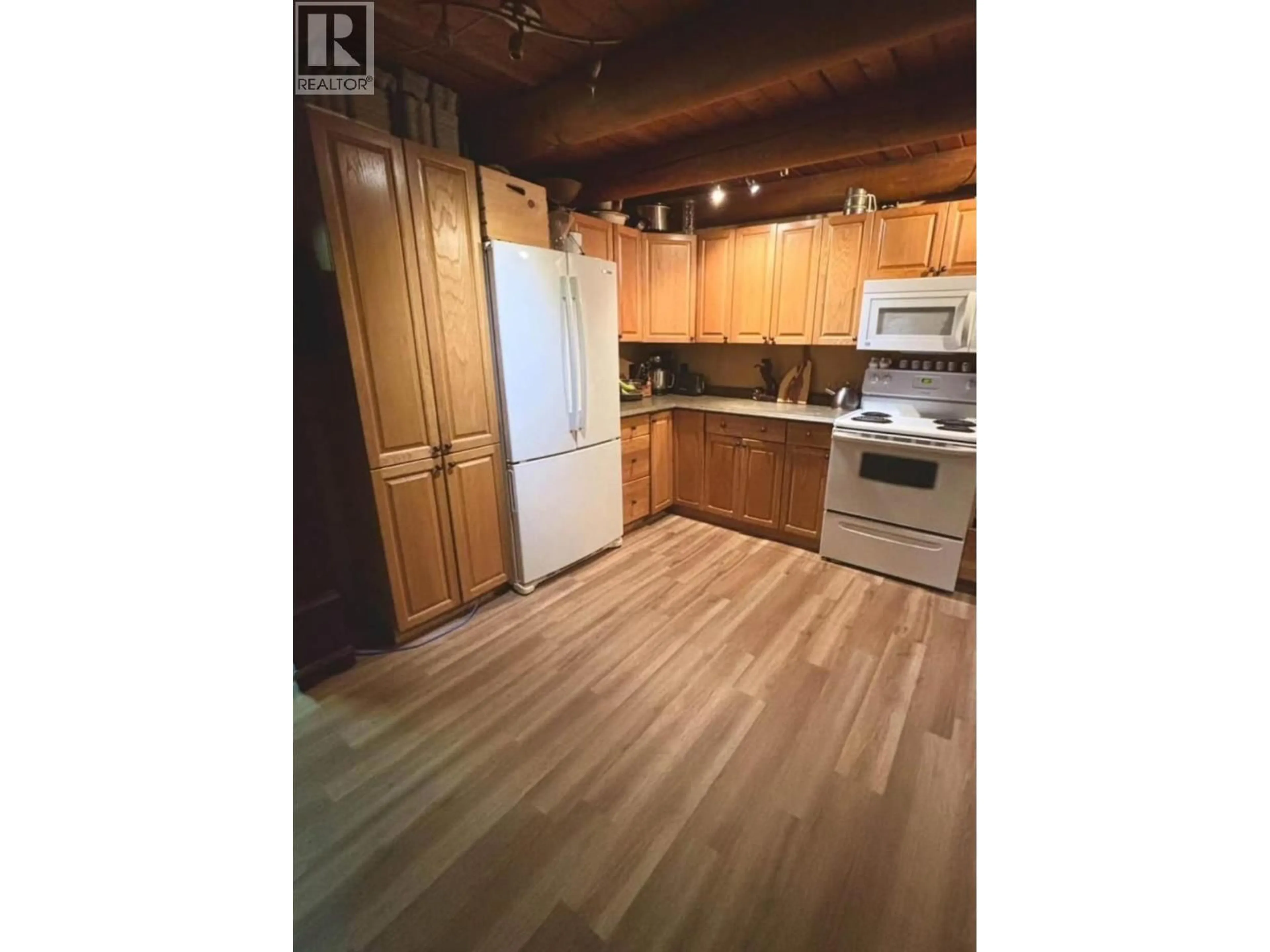 Standard kitchen, wood/laminate floor for 4312 245 ROAD, Dawson Creek British Columbia V0C1N0